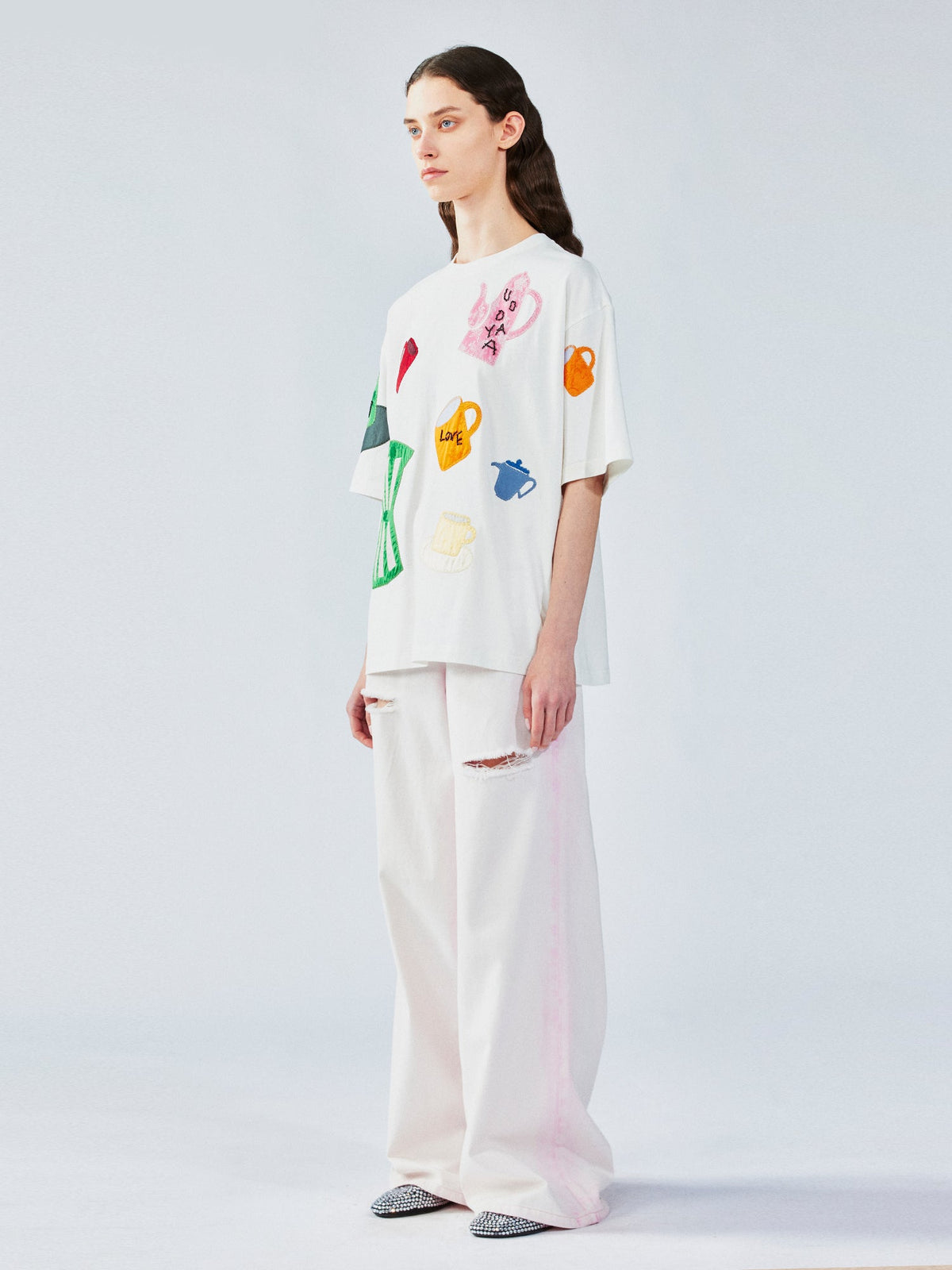 家庭用品のシルエットアップリケTシャツ