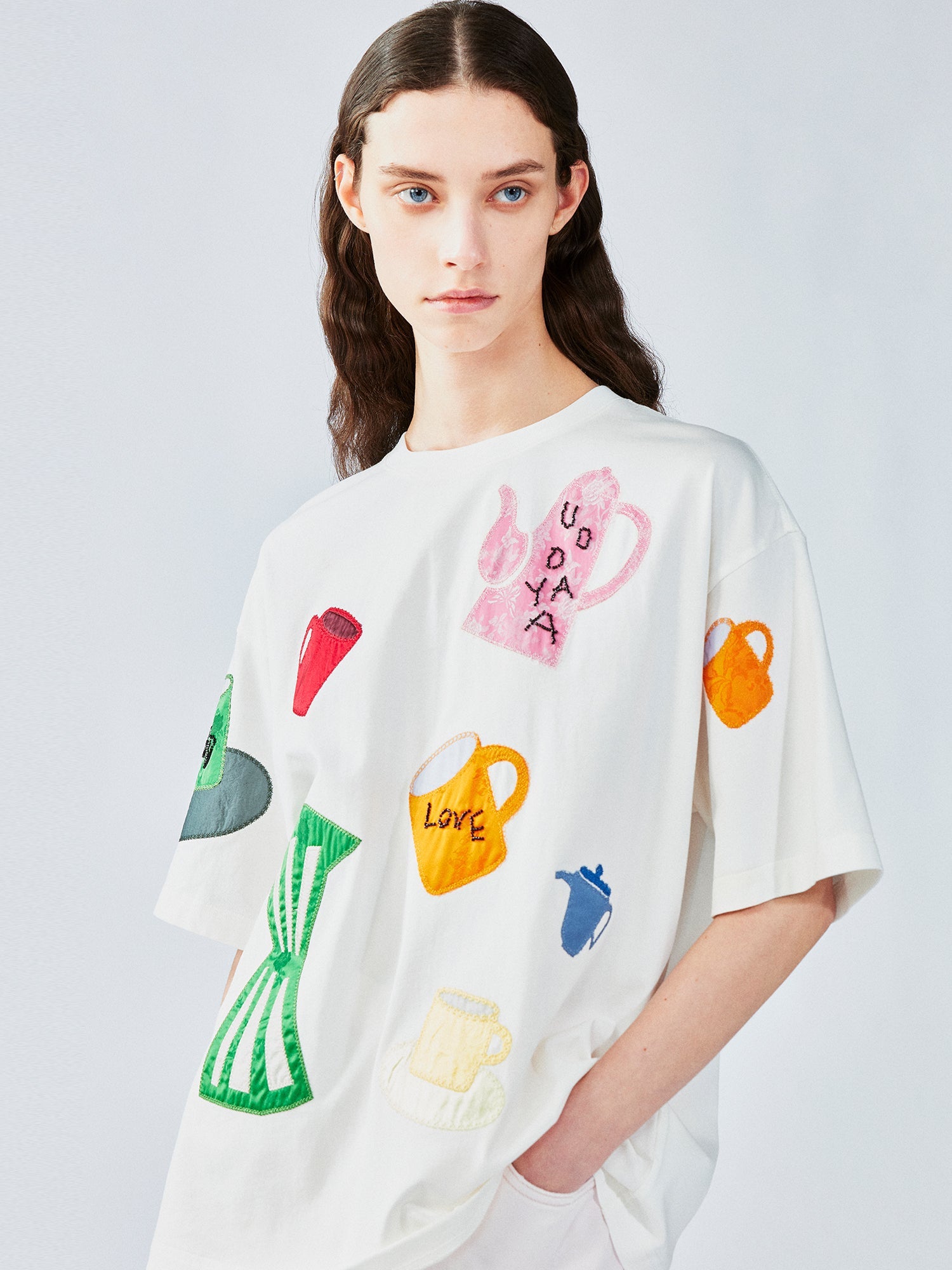 Household object silhouette appliqué t-shirt