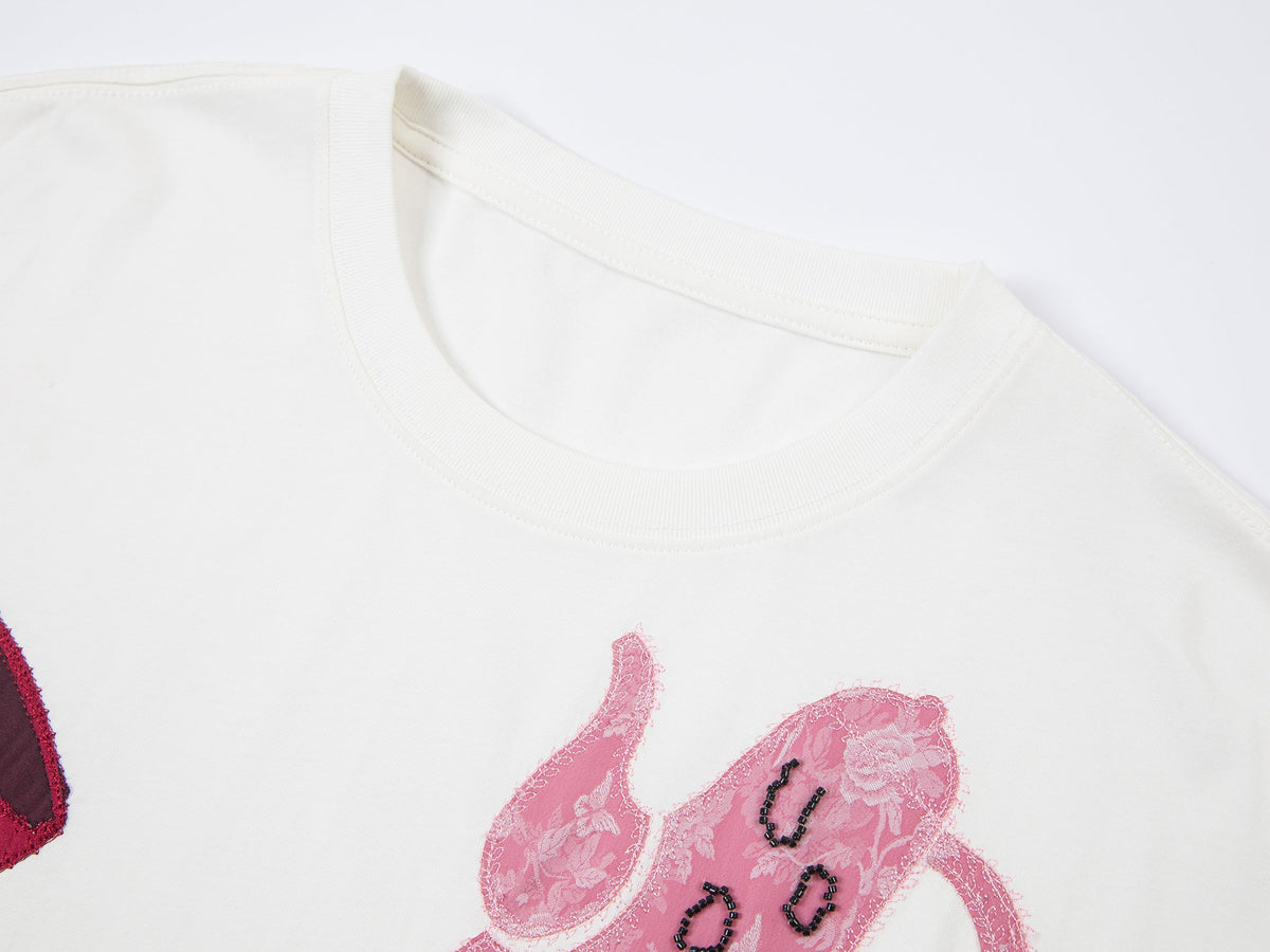 家庭用品のシルエットアップリケTシャツ
