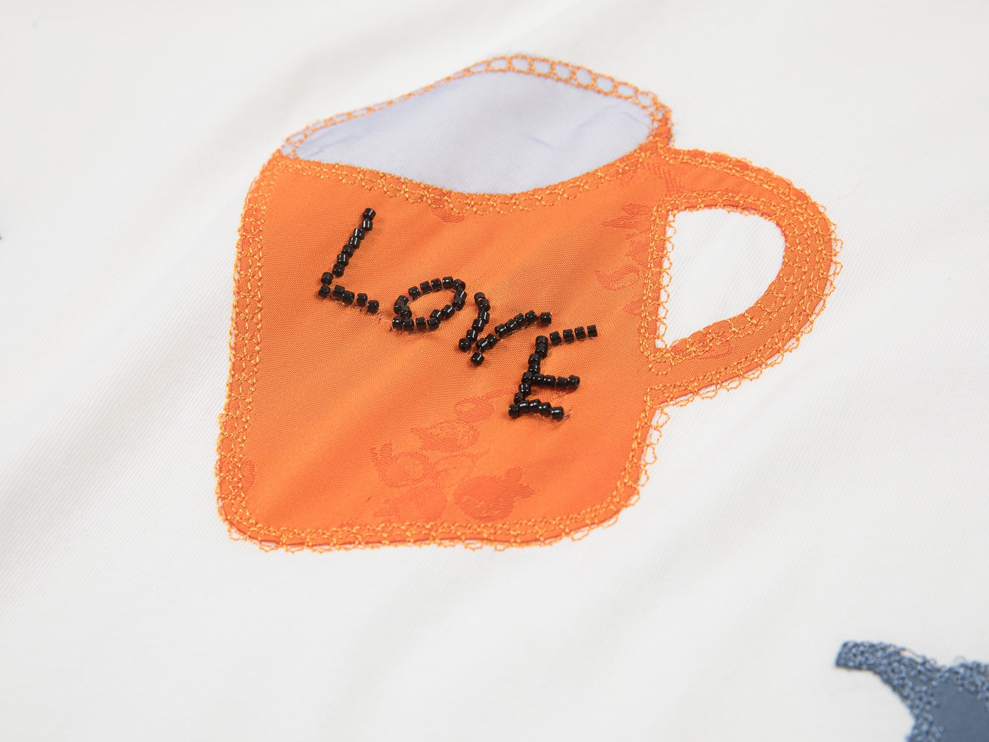 Household object silhouette appliqué t-shirt