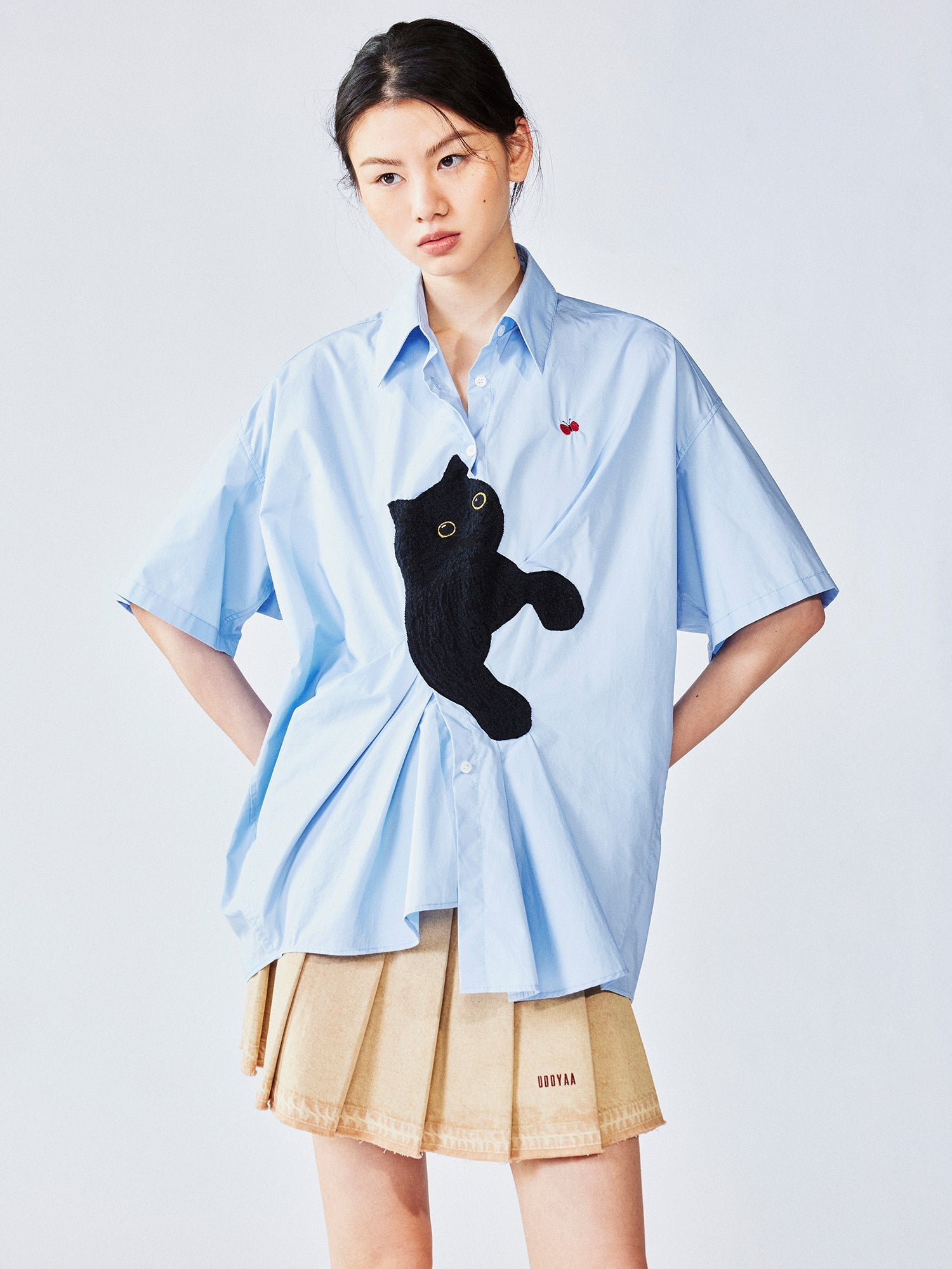 Cat-chasing-butterfly embroidery shirt