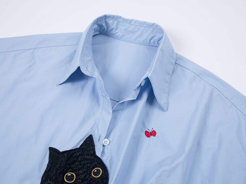 猫を追いかける蝶の刺繍シャツ