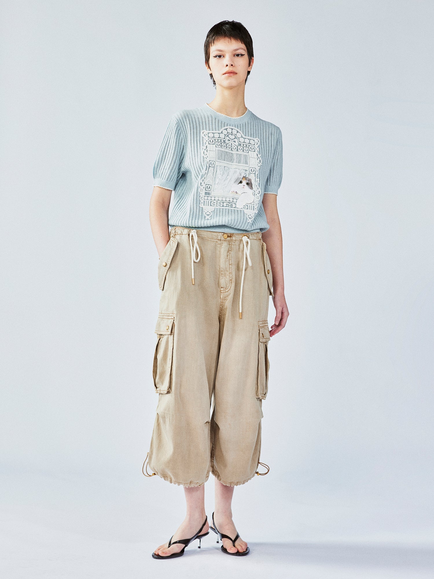 Knitted cat window scene T-shirt