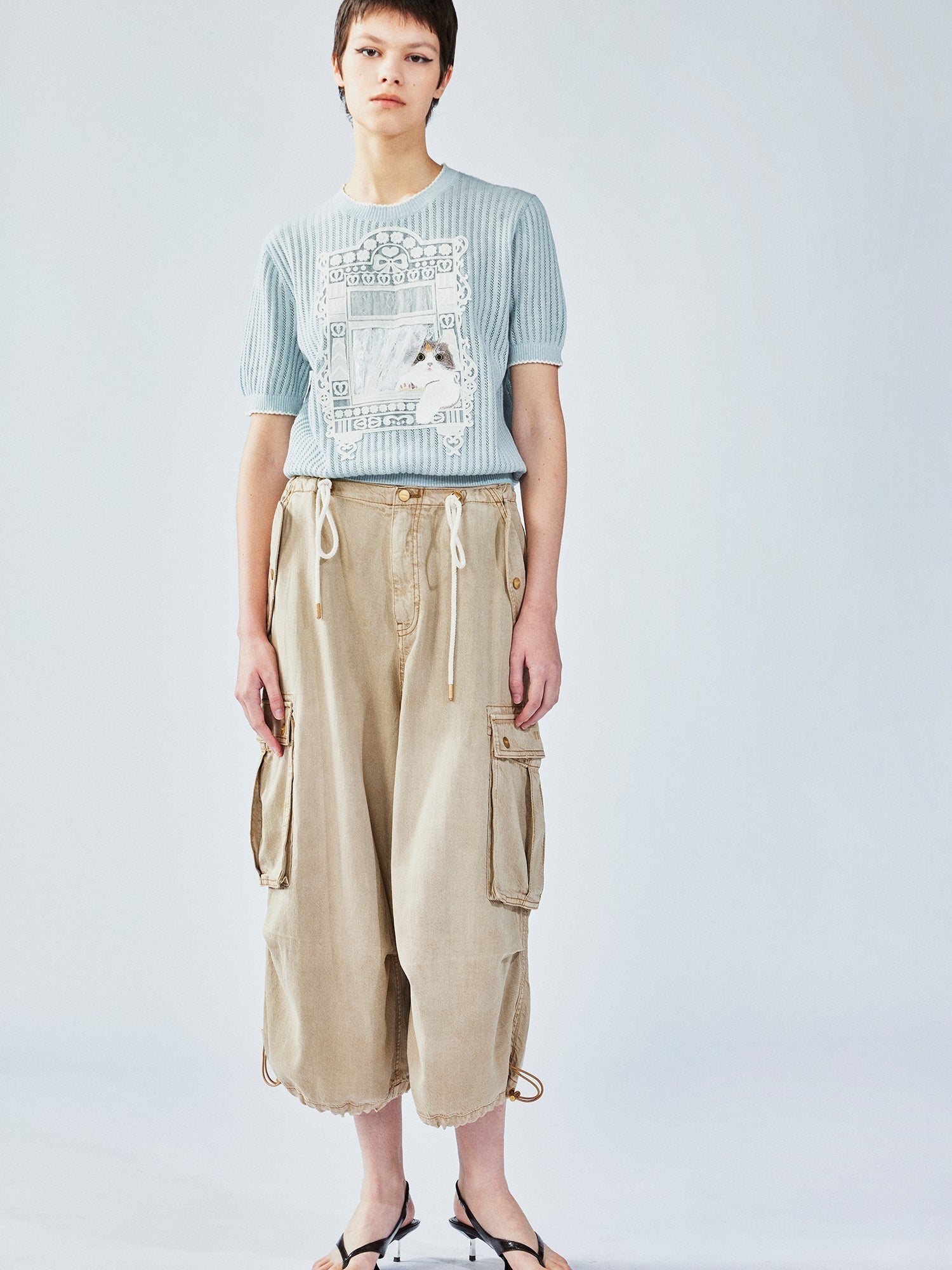 Knitted cat window scene T-shirt