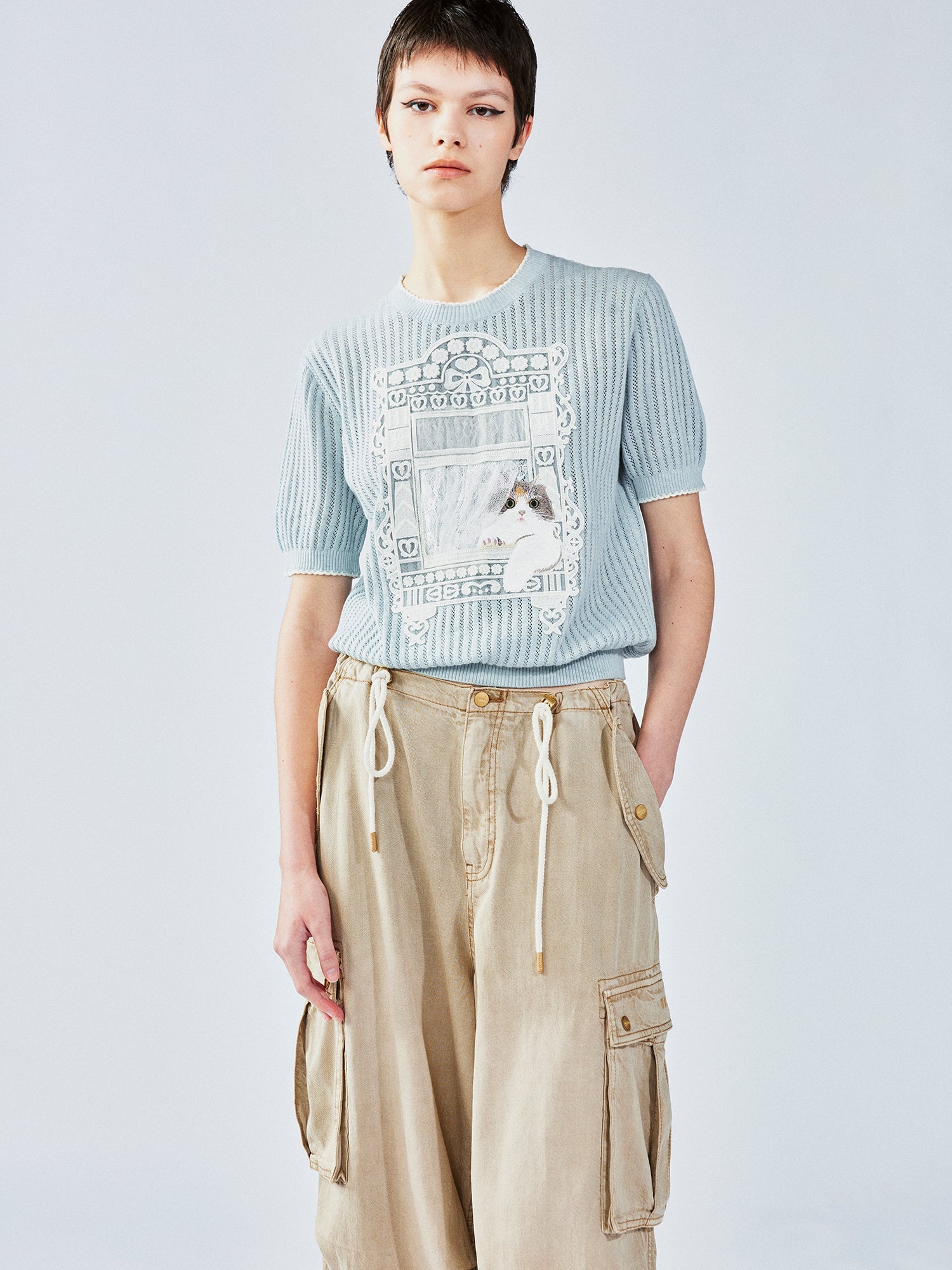 Knitted cat window scene T-shirt