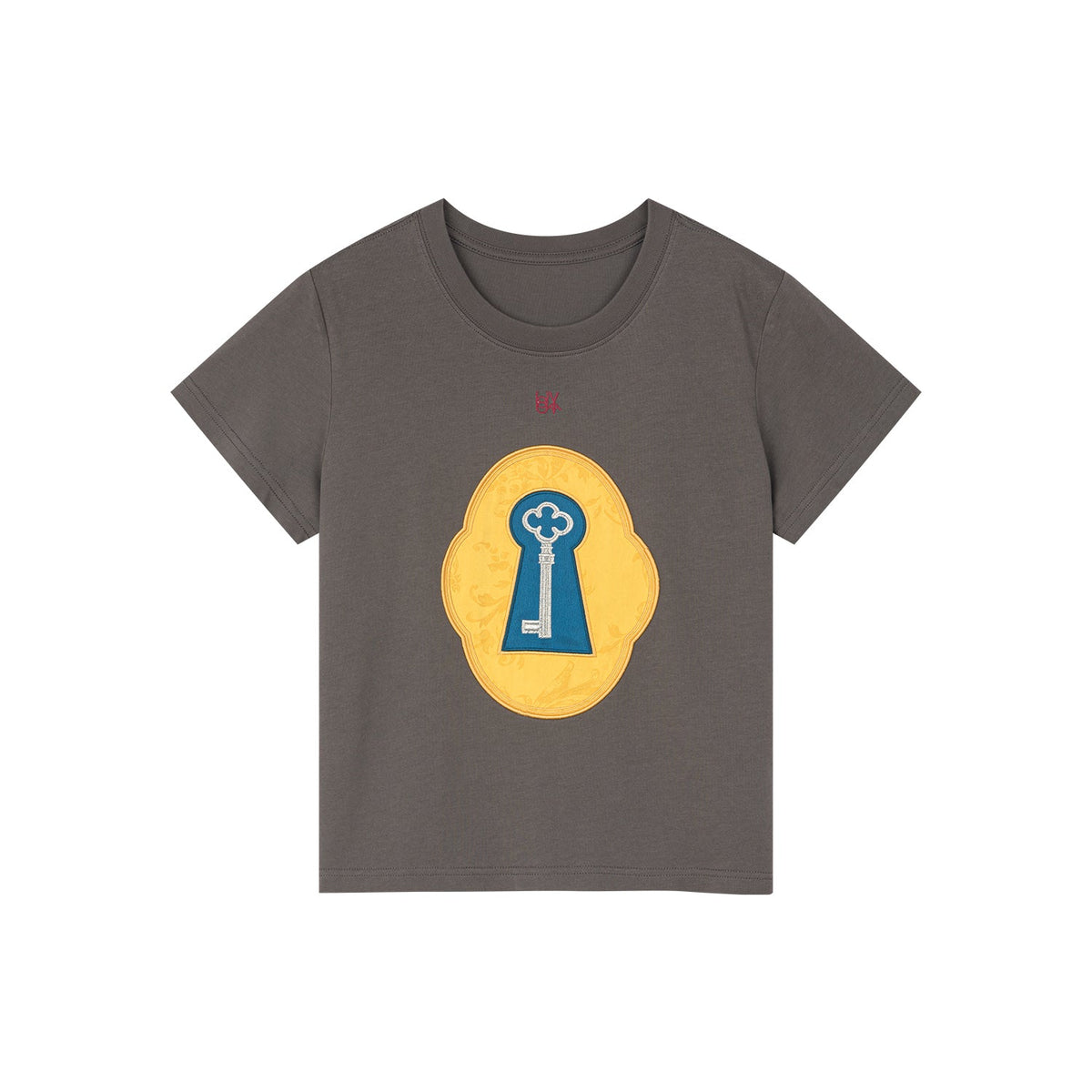 シュールなデザインのキーアップリケTシャツ