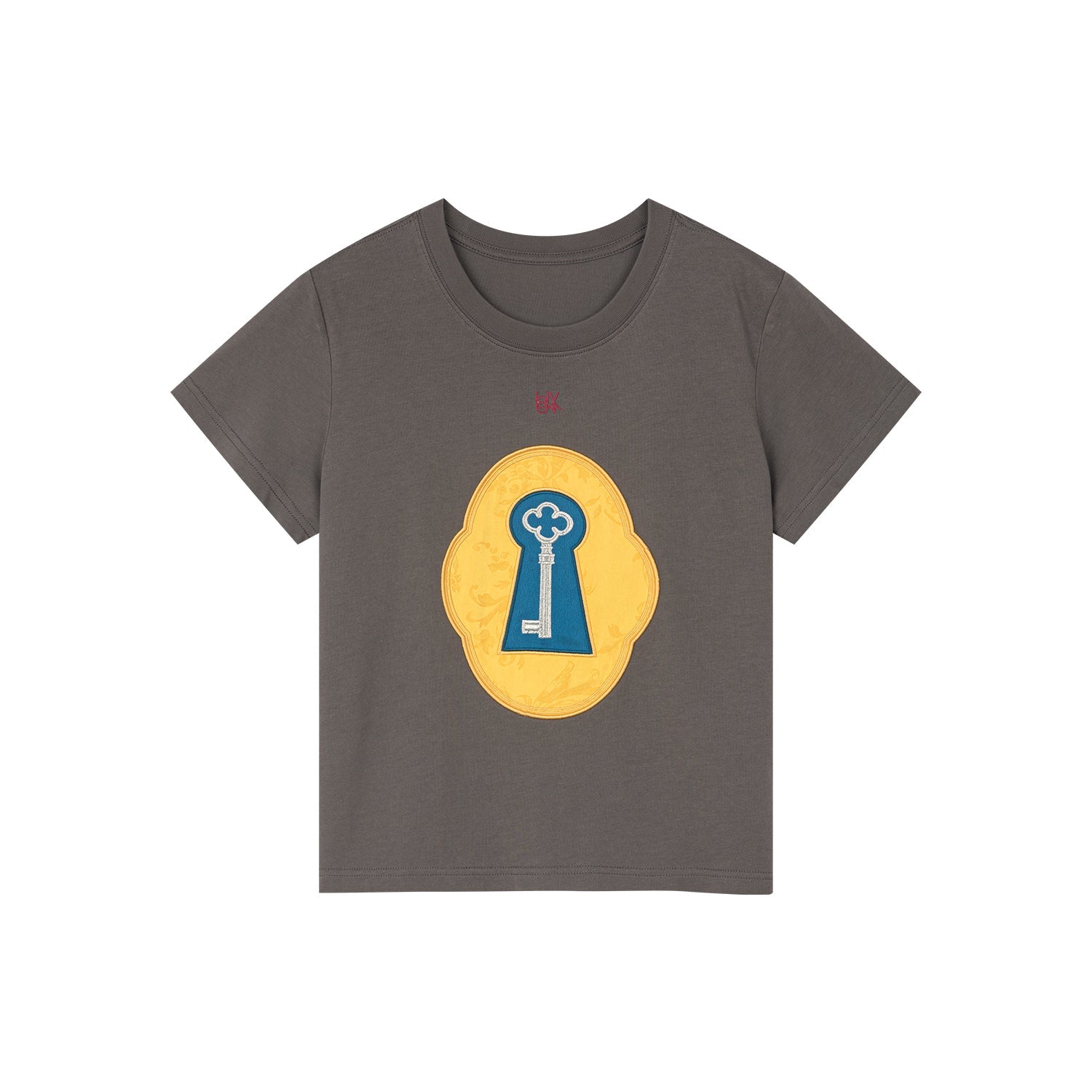 シュールなデザインのキーアップリケTシャツ