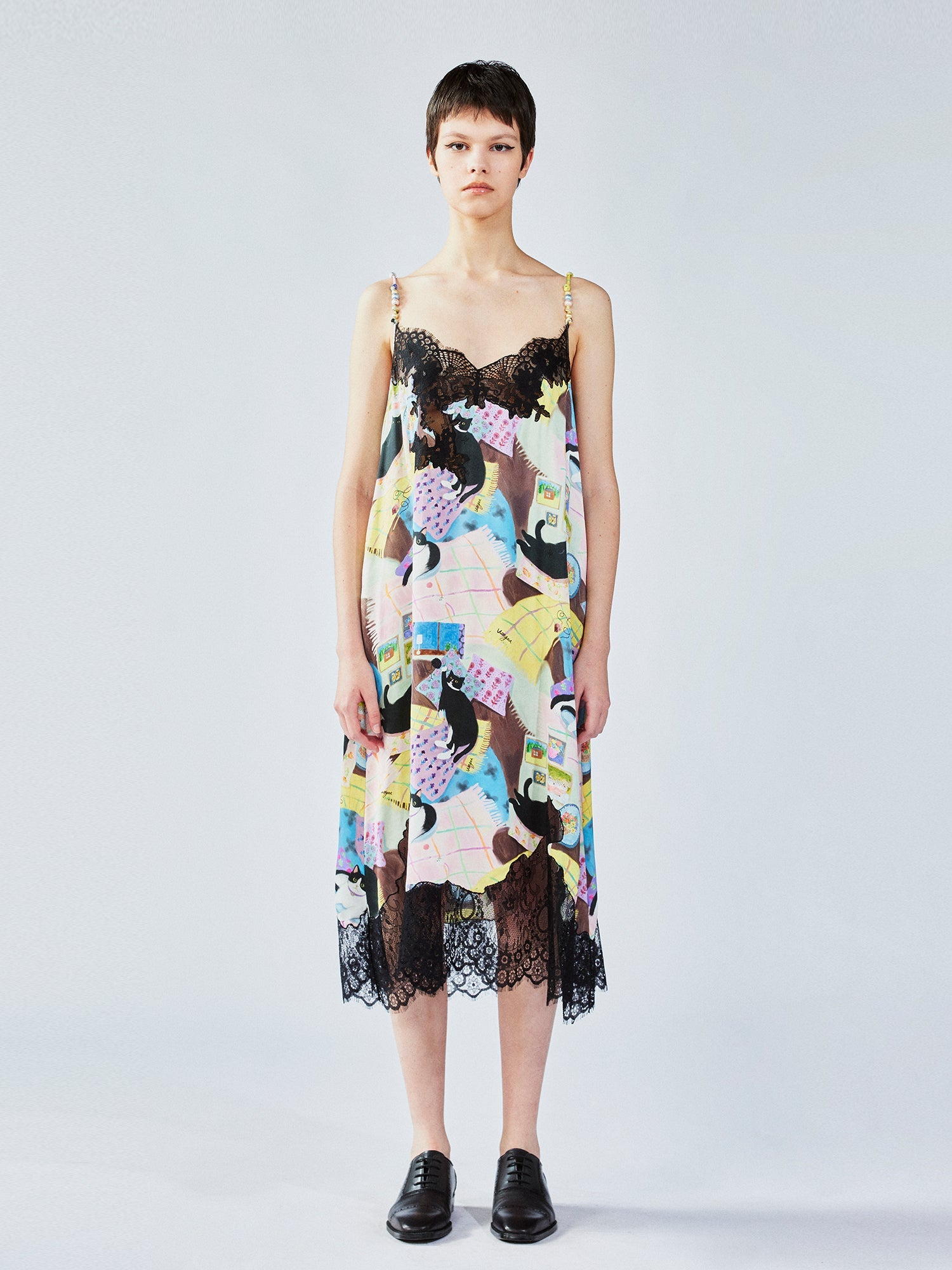 Lace slip dress with cat illustration