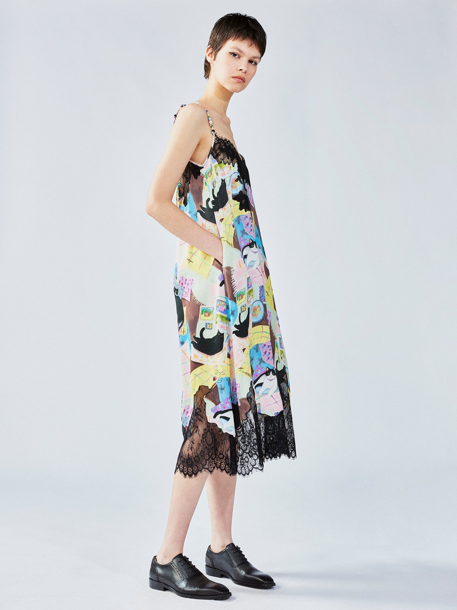Lace slip dress with cat illustration
