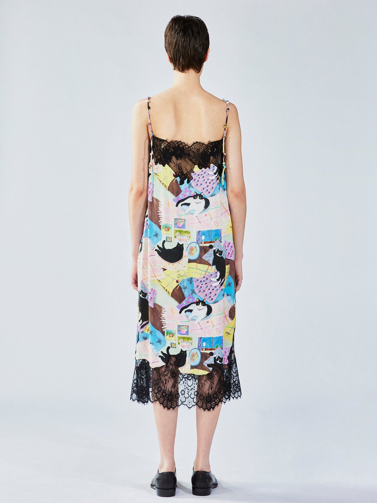 Lace slip dress with cat illustration