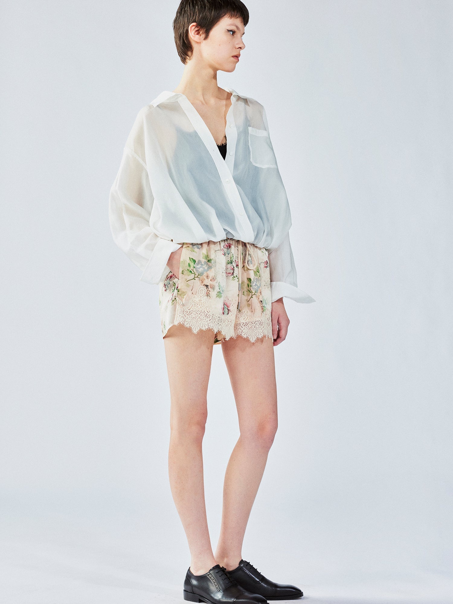 Vintage wallpaper-inspired floral lace shorts