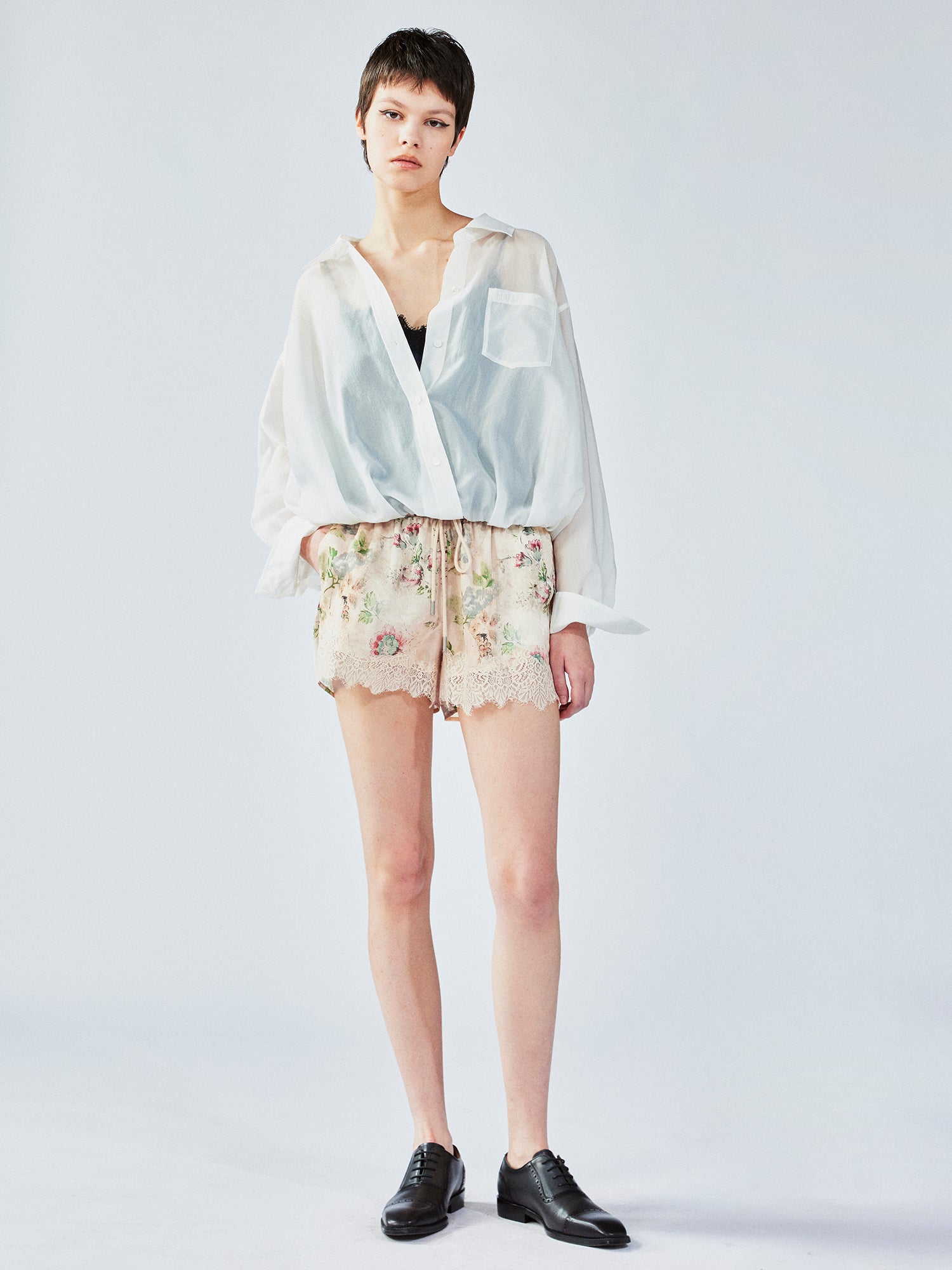Vintage wallpaper-inspired floral lace shorts