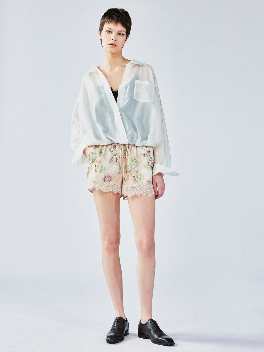 Vintage wallpaper-inspired floral lace shorts