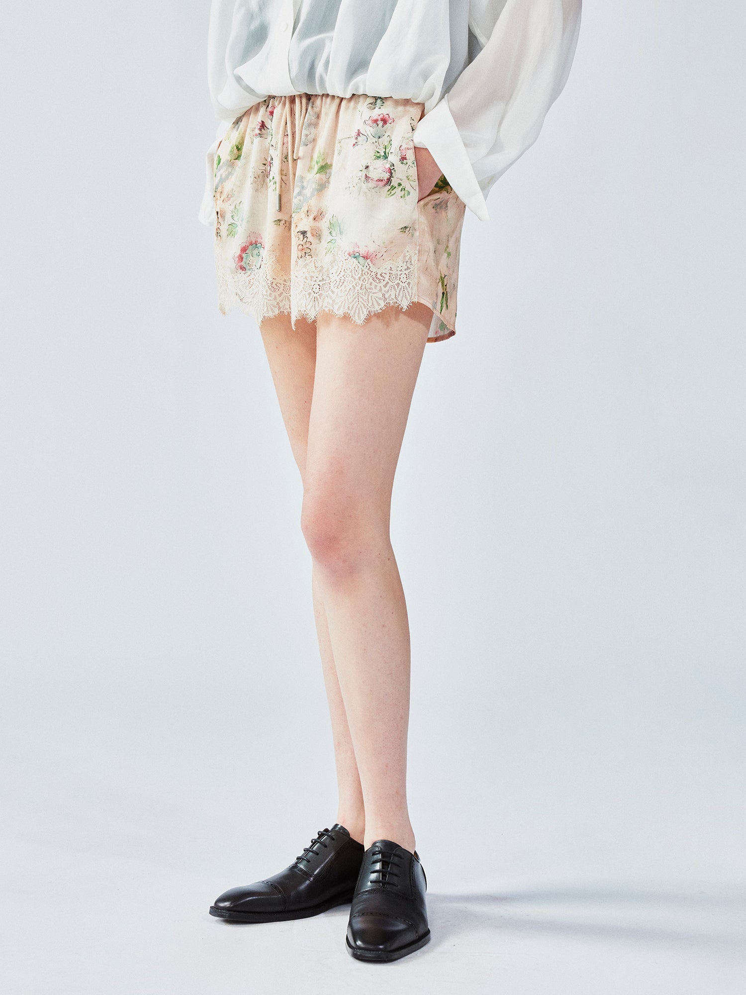 Vintage wallpaper-inspired floral lace shorts