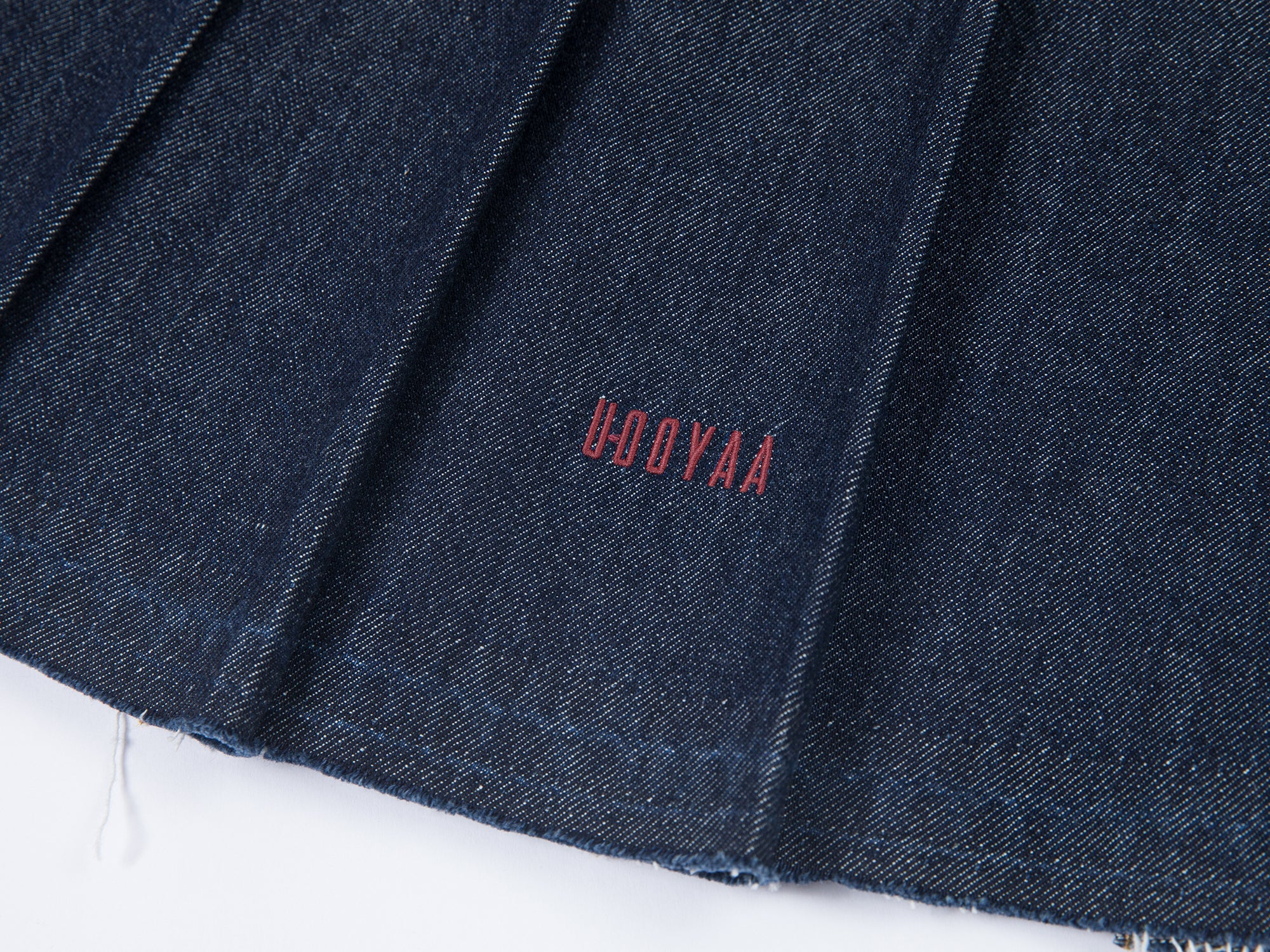 Pleated denim mini skirt