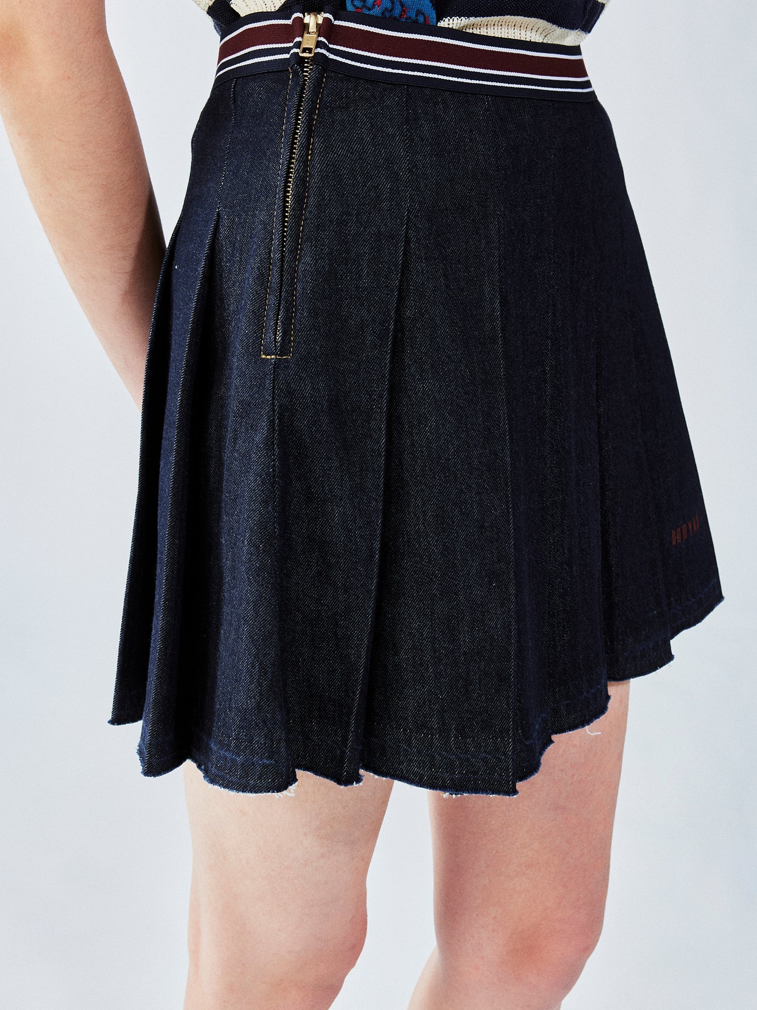 Pleated denim mini skirt
