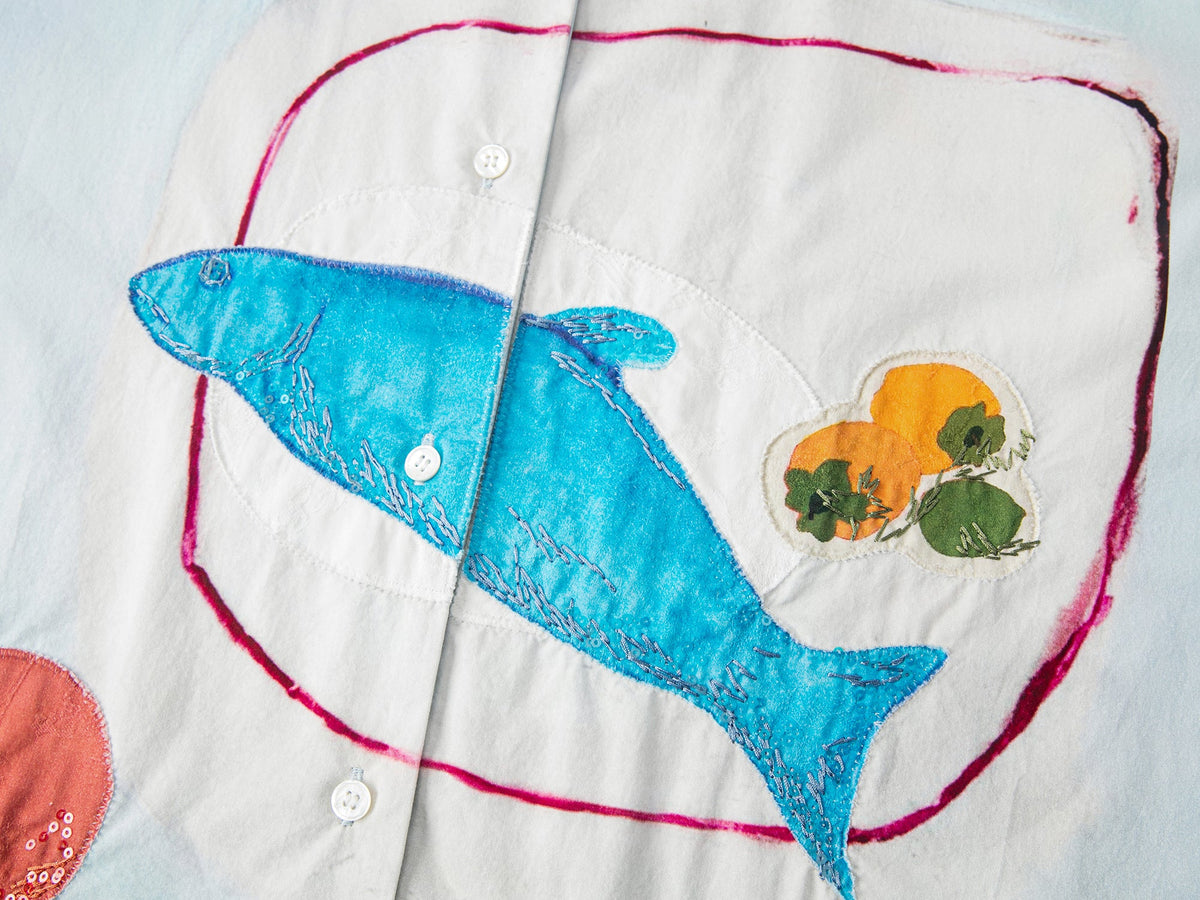 Hand-drawn fish-on-plate graphic shirt