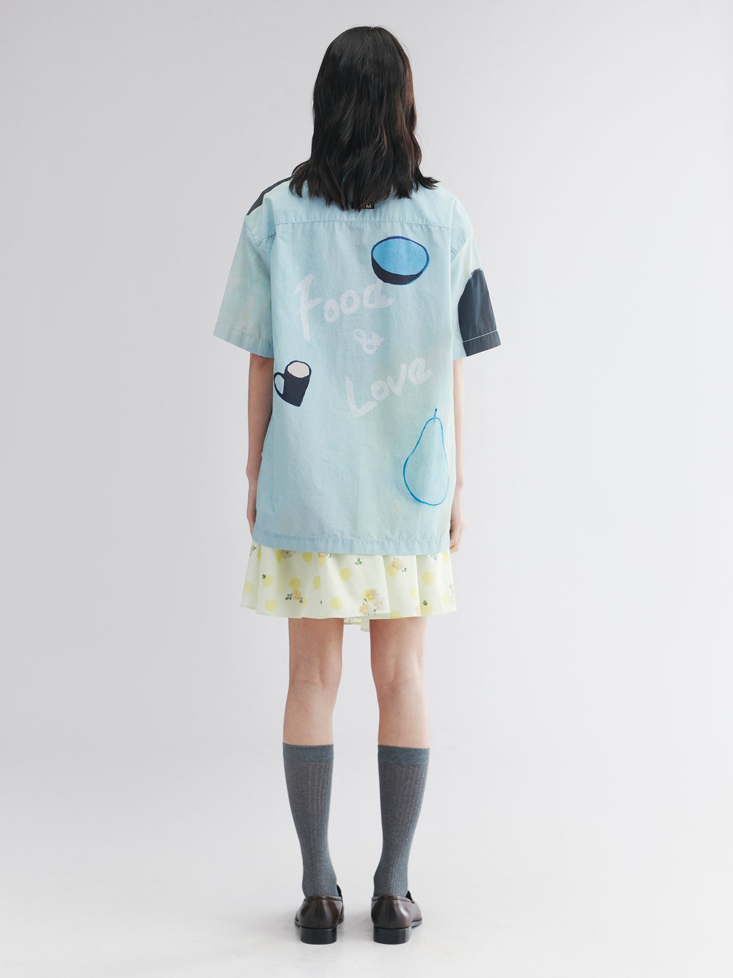 Hand-drawn fish-on-plate graphic shirt