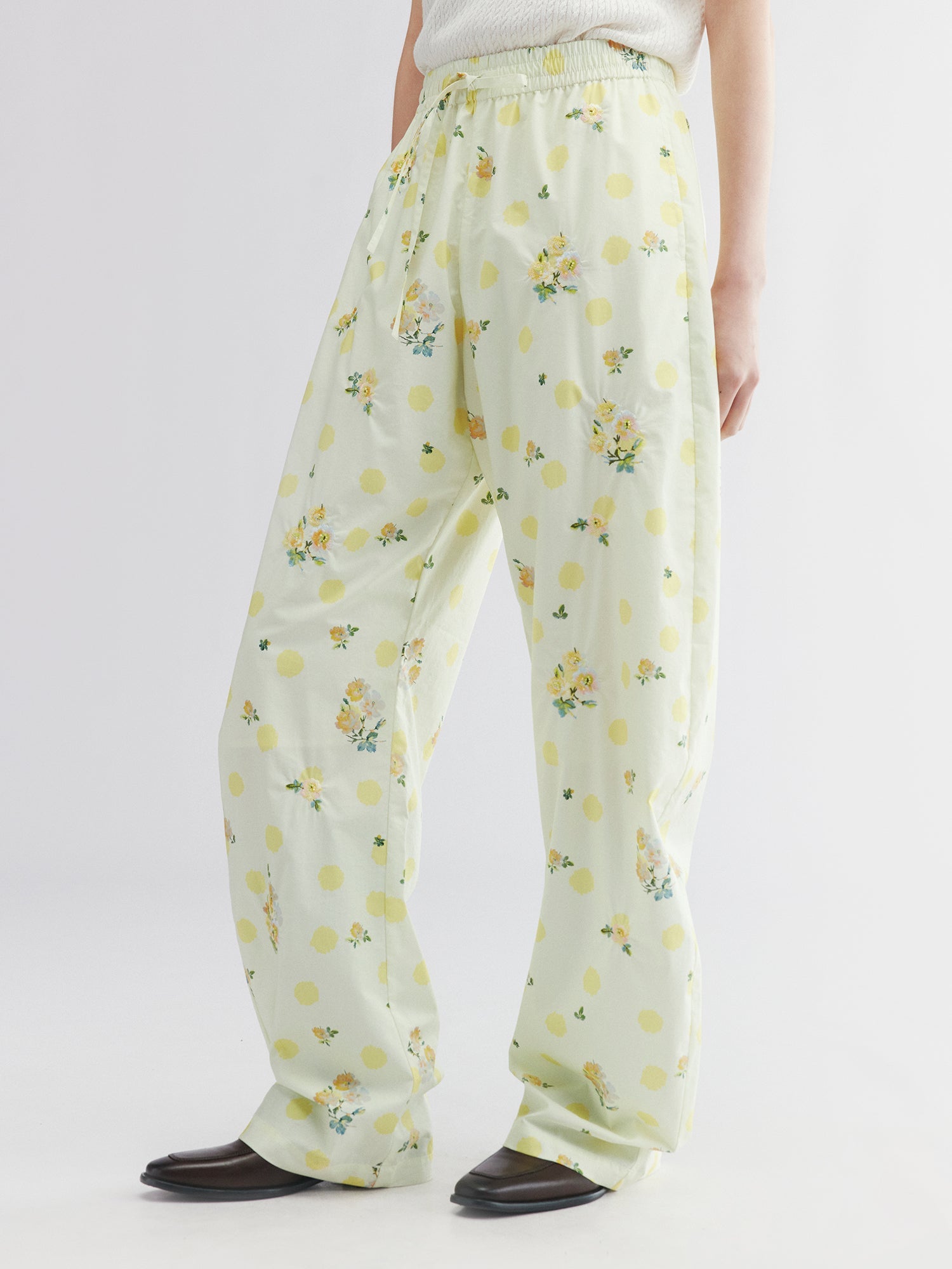 Yellow floral print drawstring pants