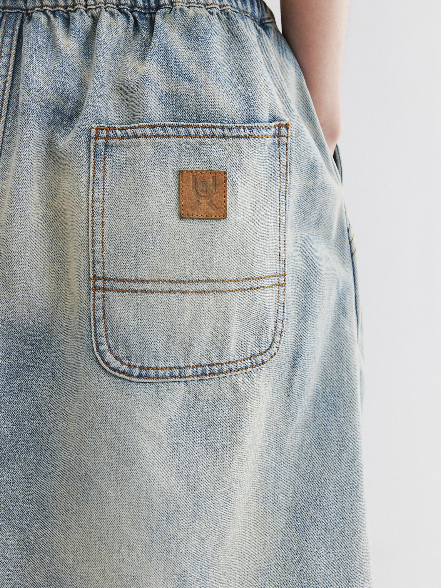 Washed denim utility skirt