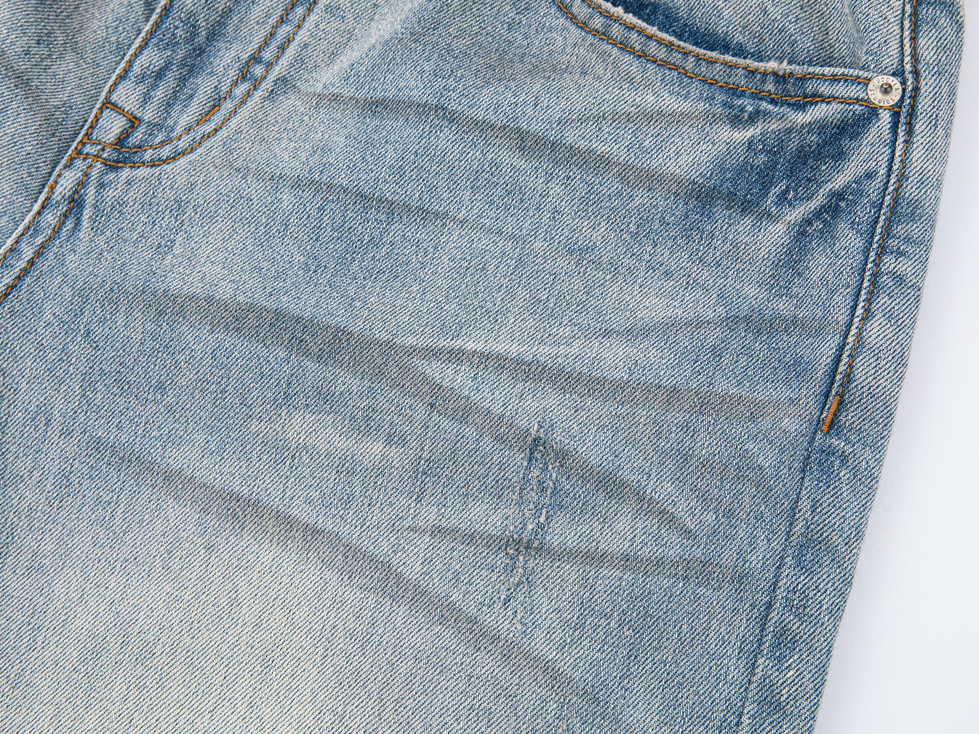 Whiskered crinkled denim pants