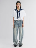 Whiskered crinkled denim pants