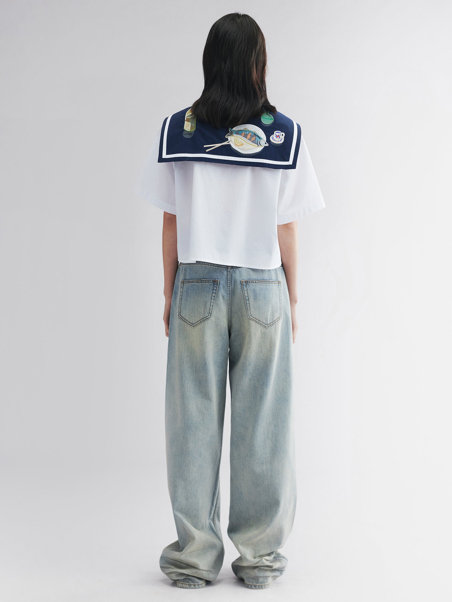 Whiskered crinkled denim pants