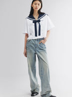 Whiskered crinkled denim pants