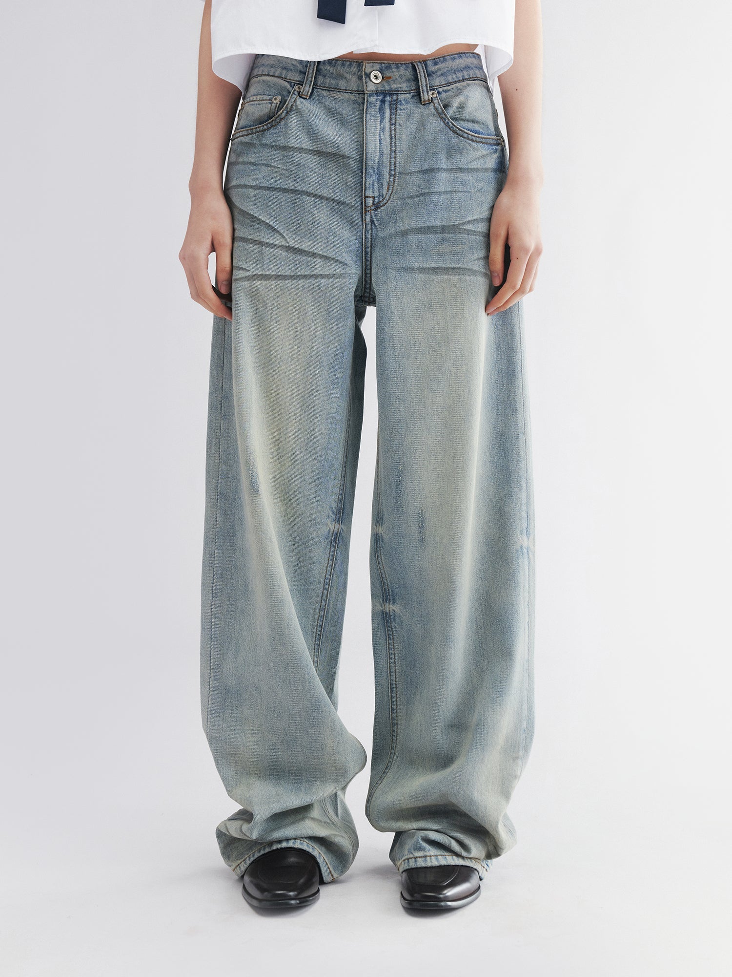 Whiskered crinkled denim pants