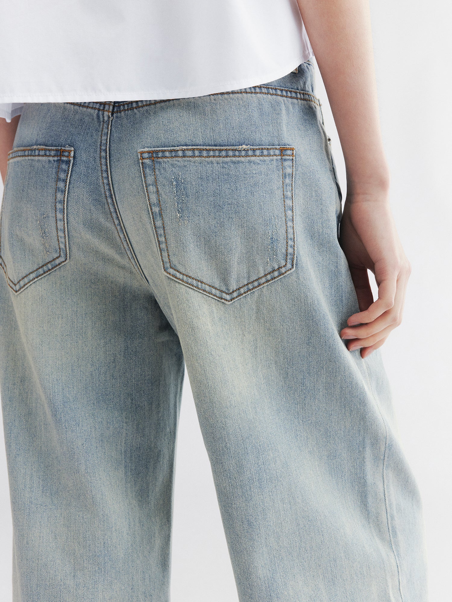 Whiskered crinkled denim pants