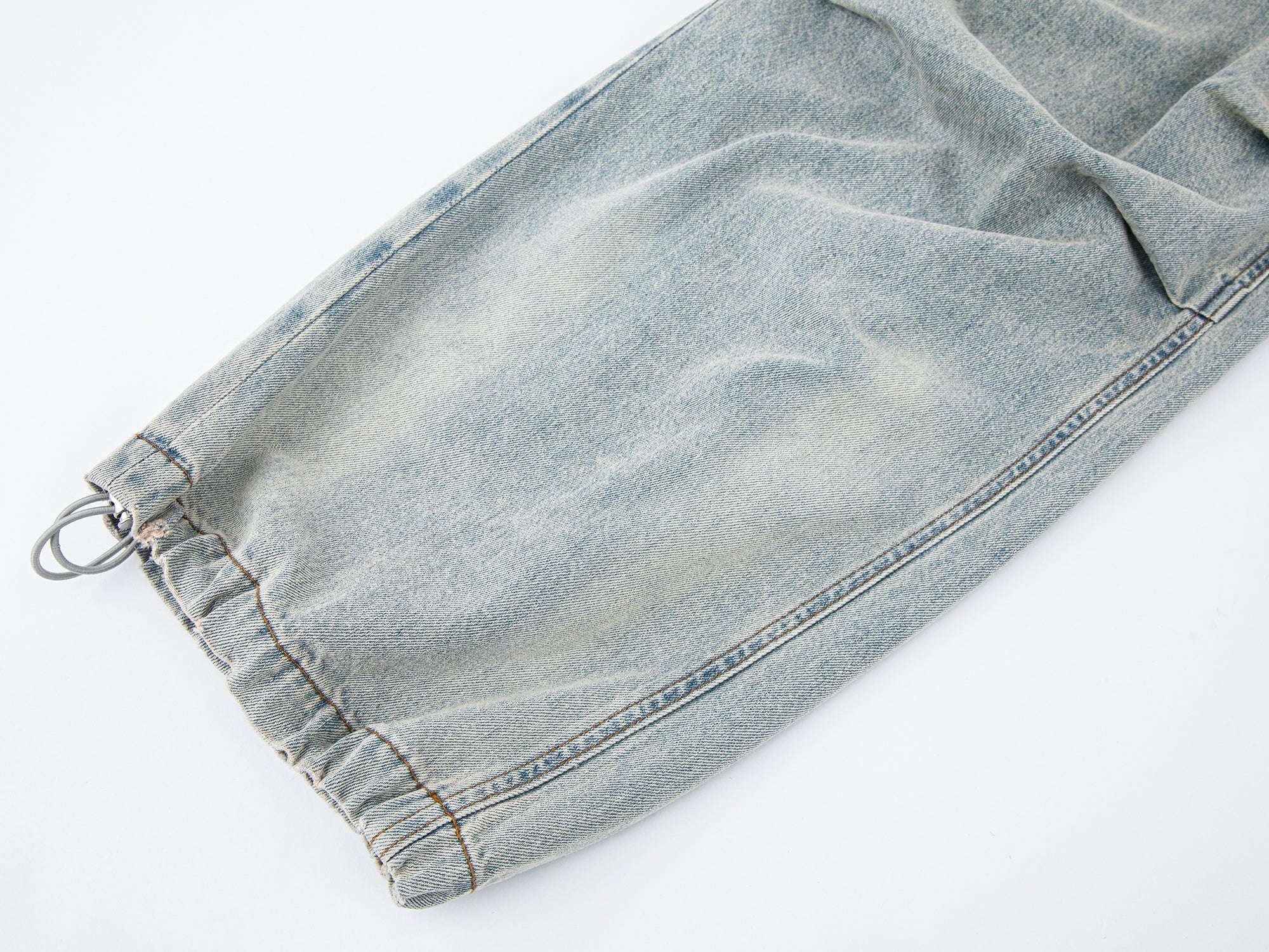 Washed denim parachute pants