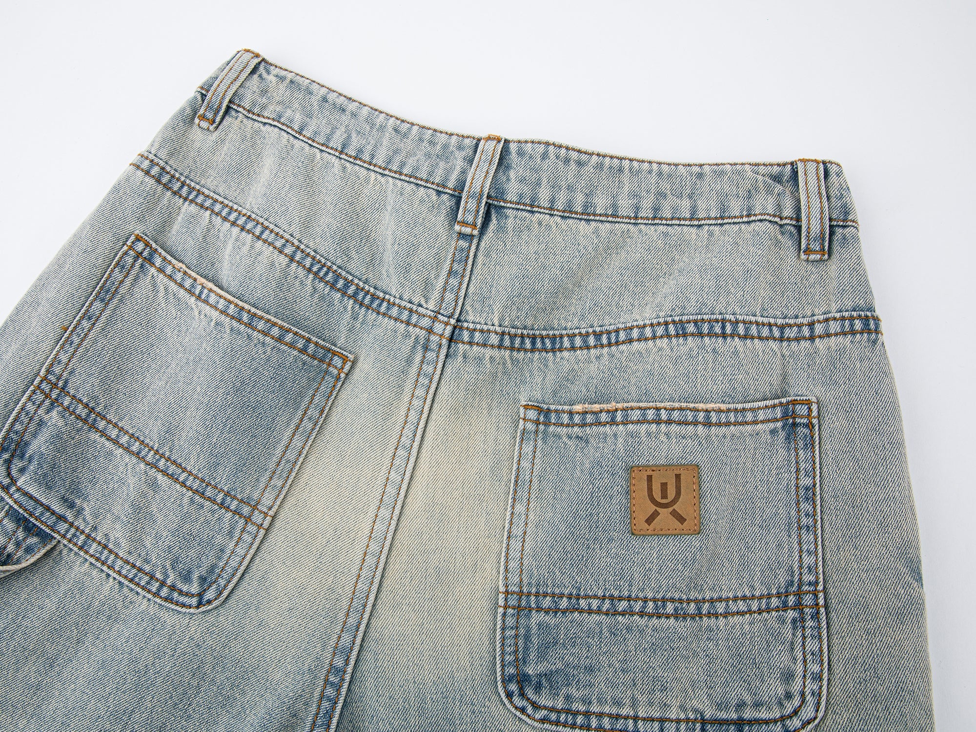 Washed denim parachute pants