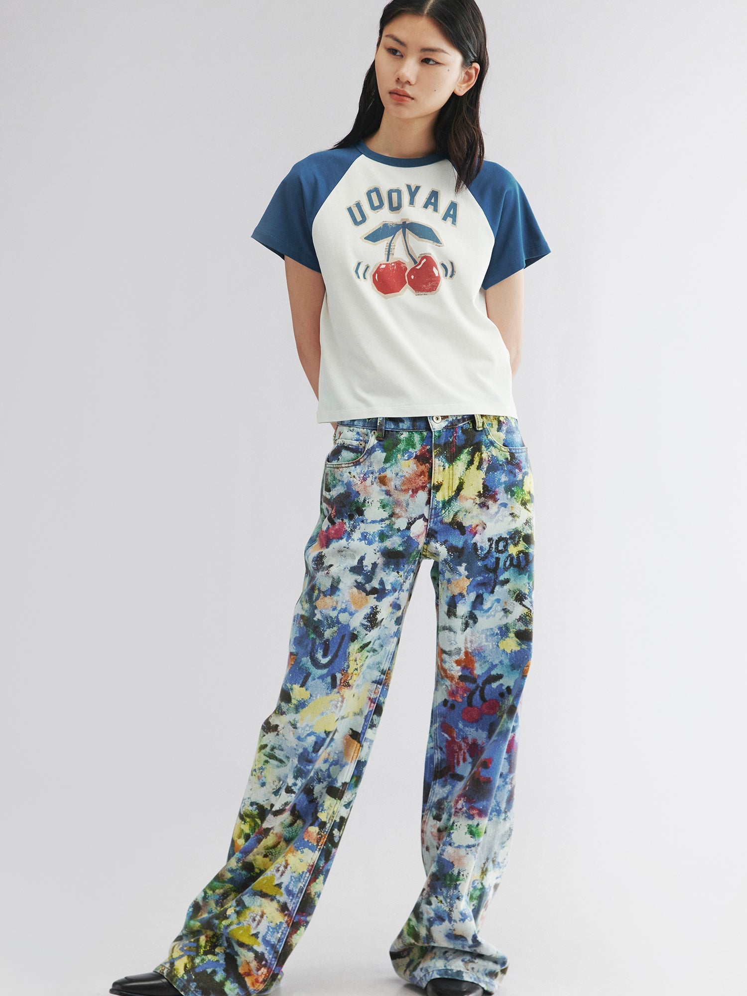 Raglan sleeve tee with dynamic cherry print