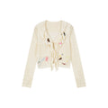 Handcrafted patch cardigan with ruffled edges