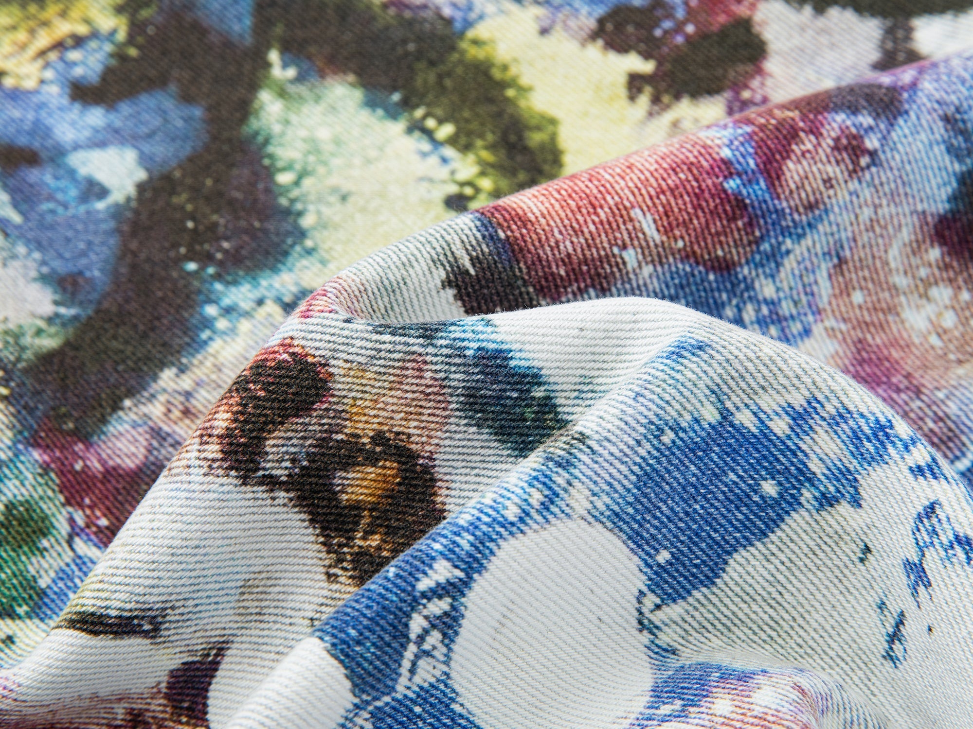 Graffiti-printed denim pants