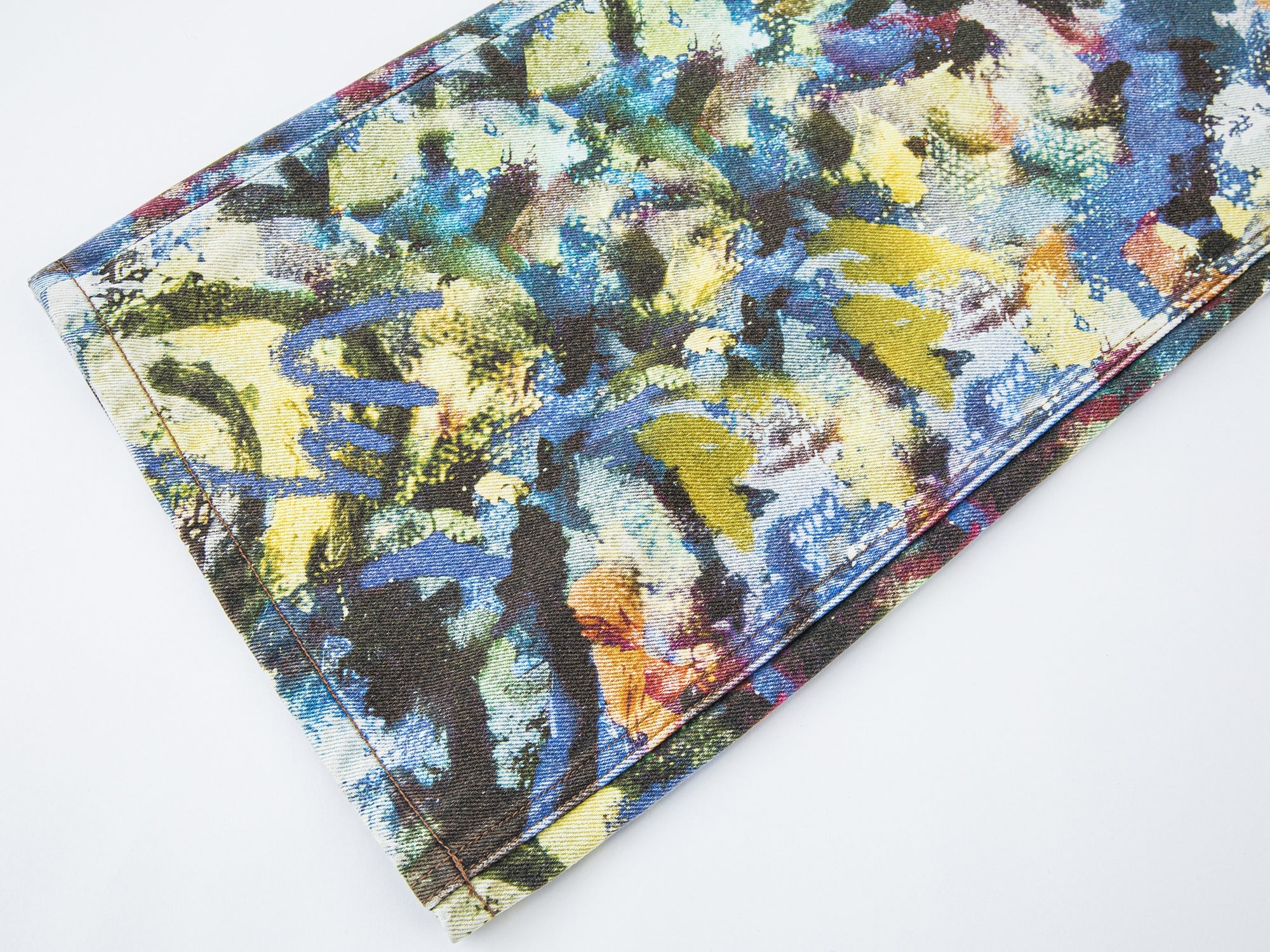 Graffiti-printed denim pants