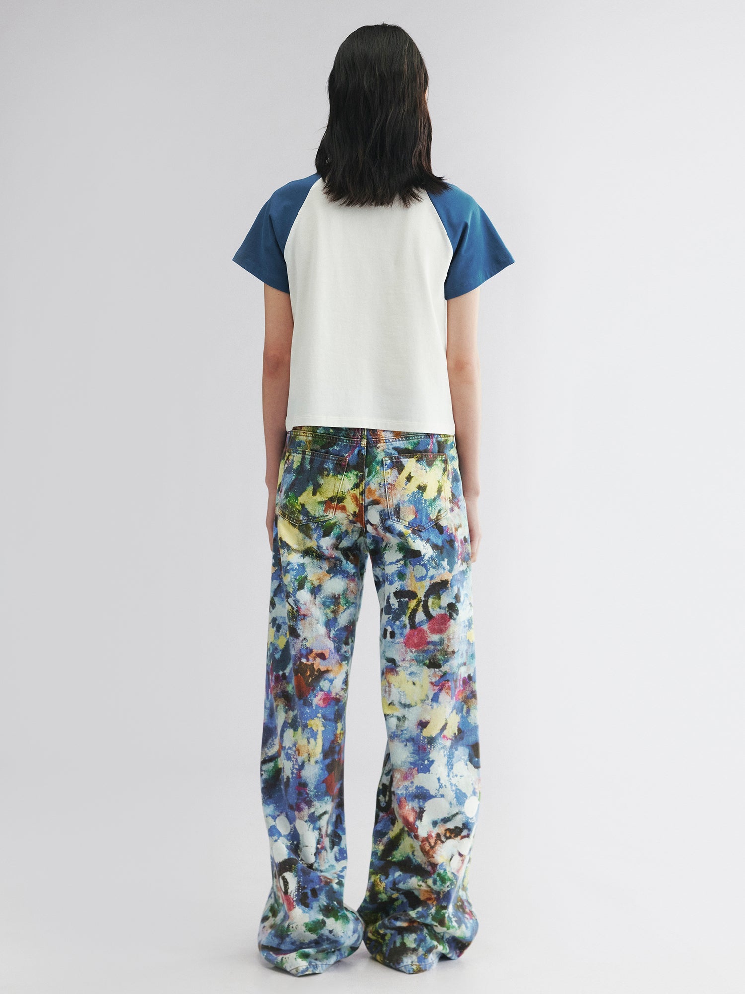 Graffiti-printed denim pants