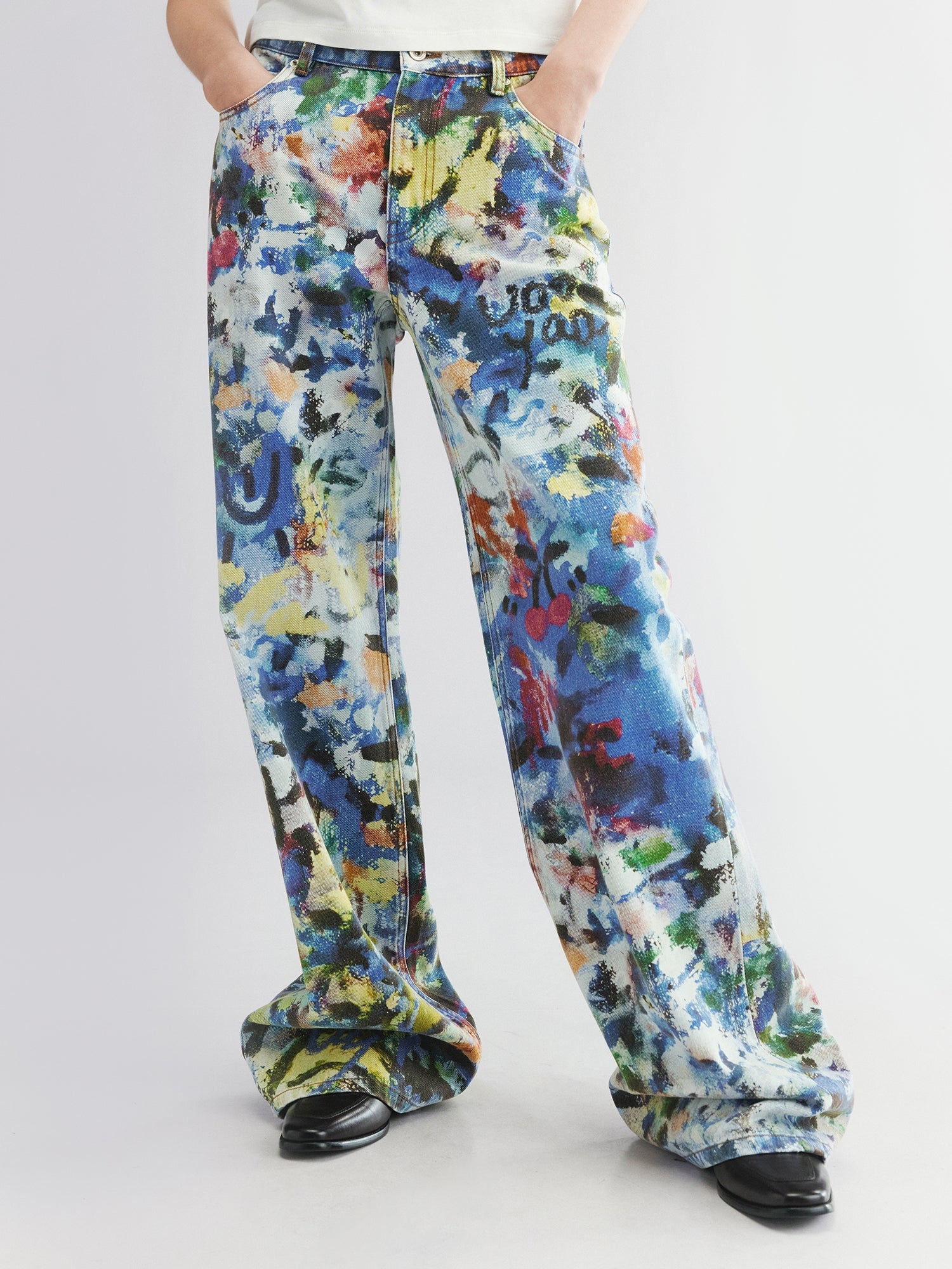 Graffiti-printed denim pants