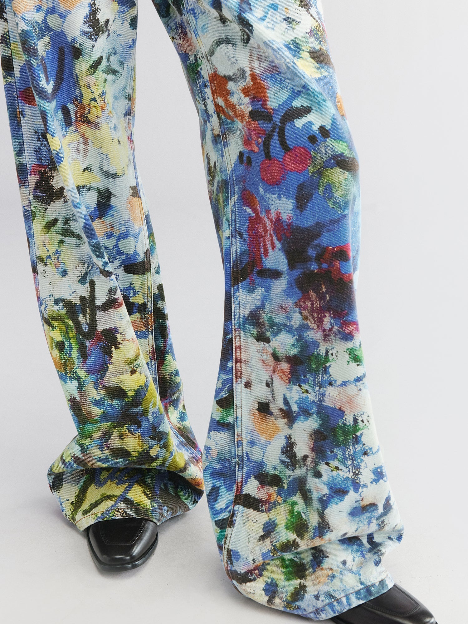 Graffiti-printed denim pants
