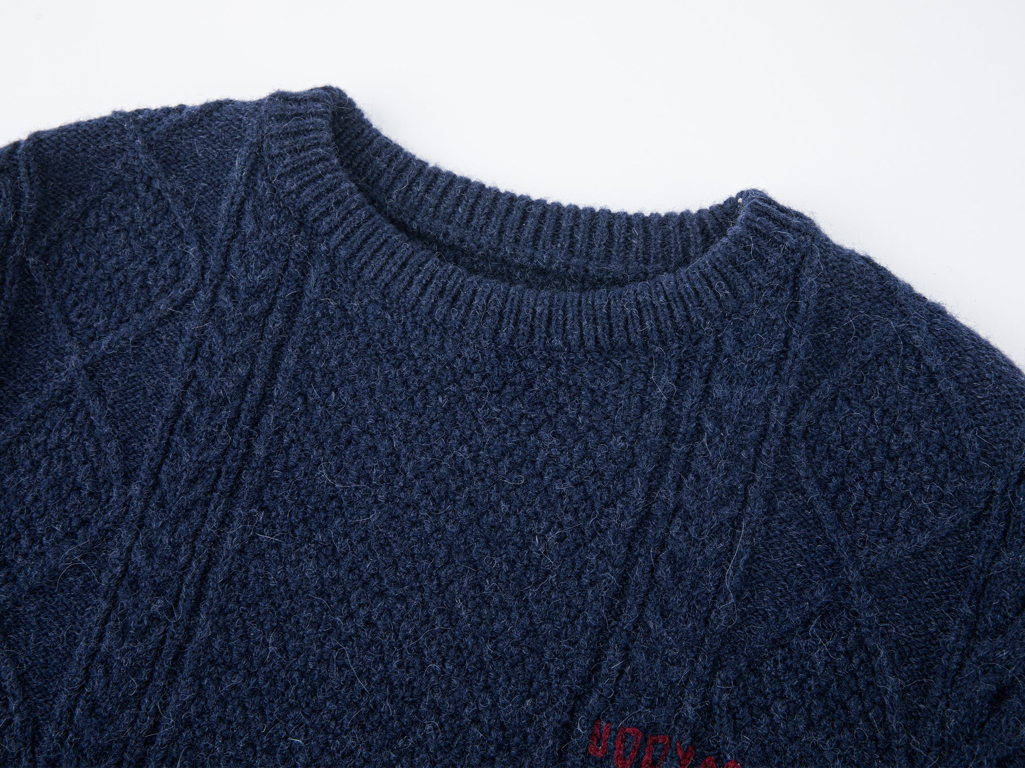 Pullover knit with layered shirt design