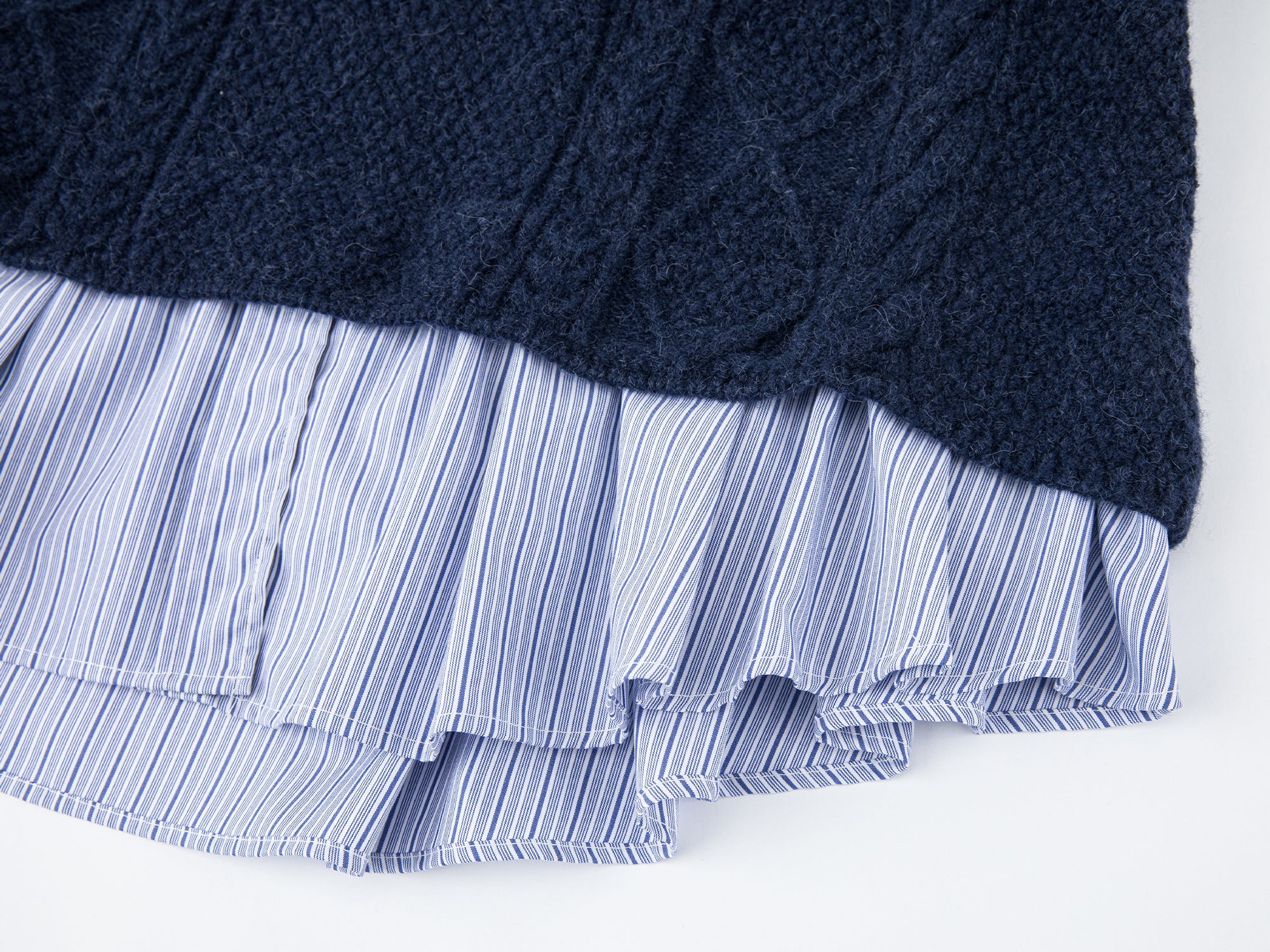 Pullover knit with layered shirt design