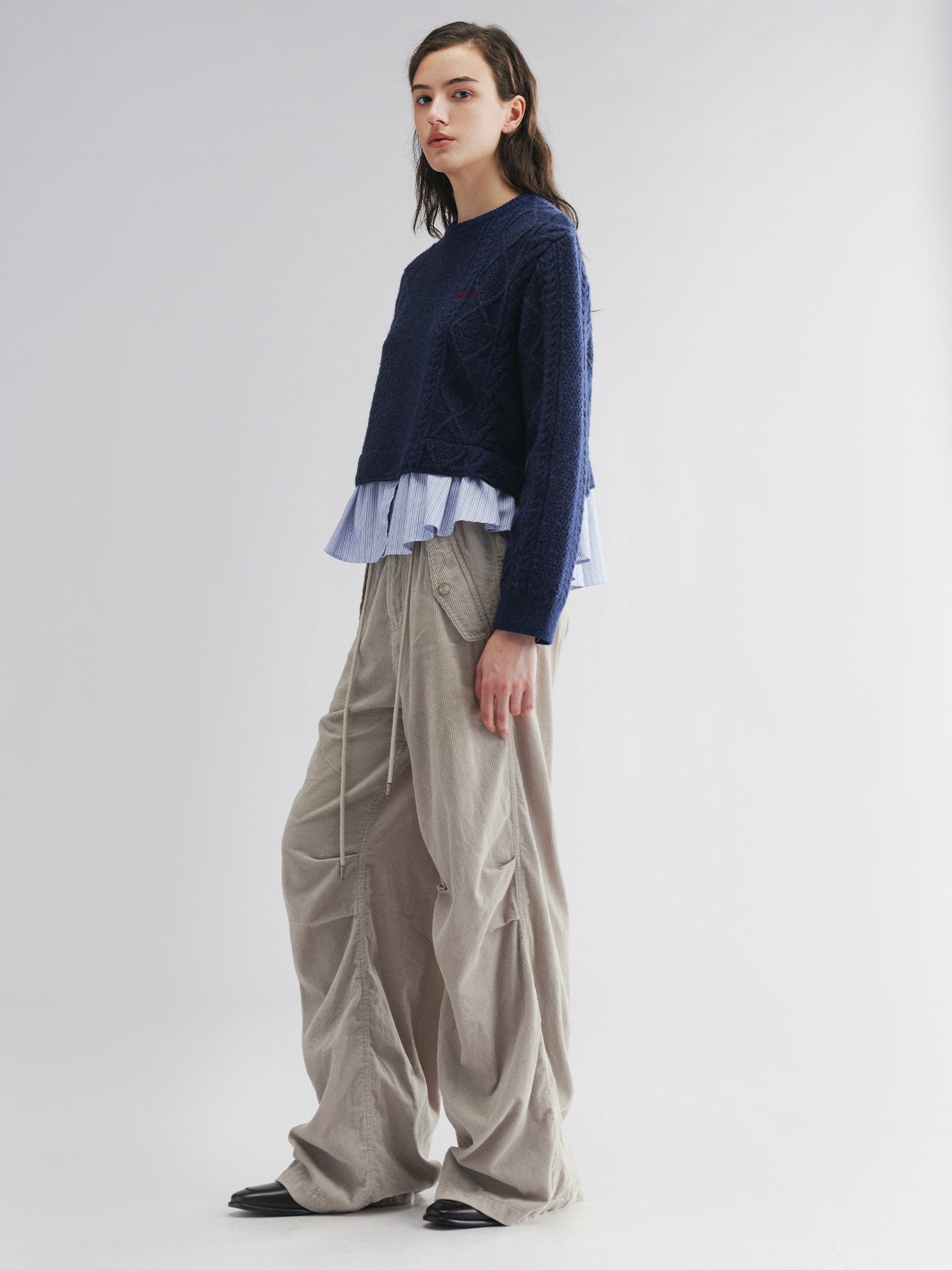 Pullover knit with layered shirt design