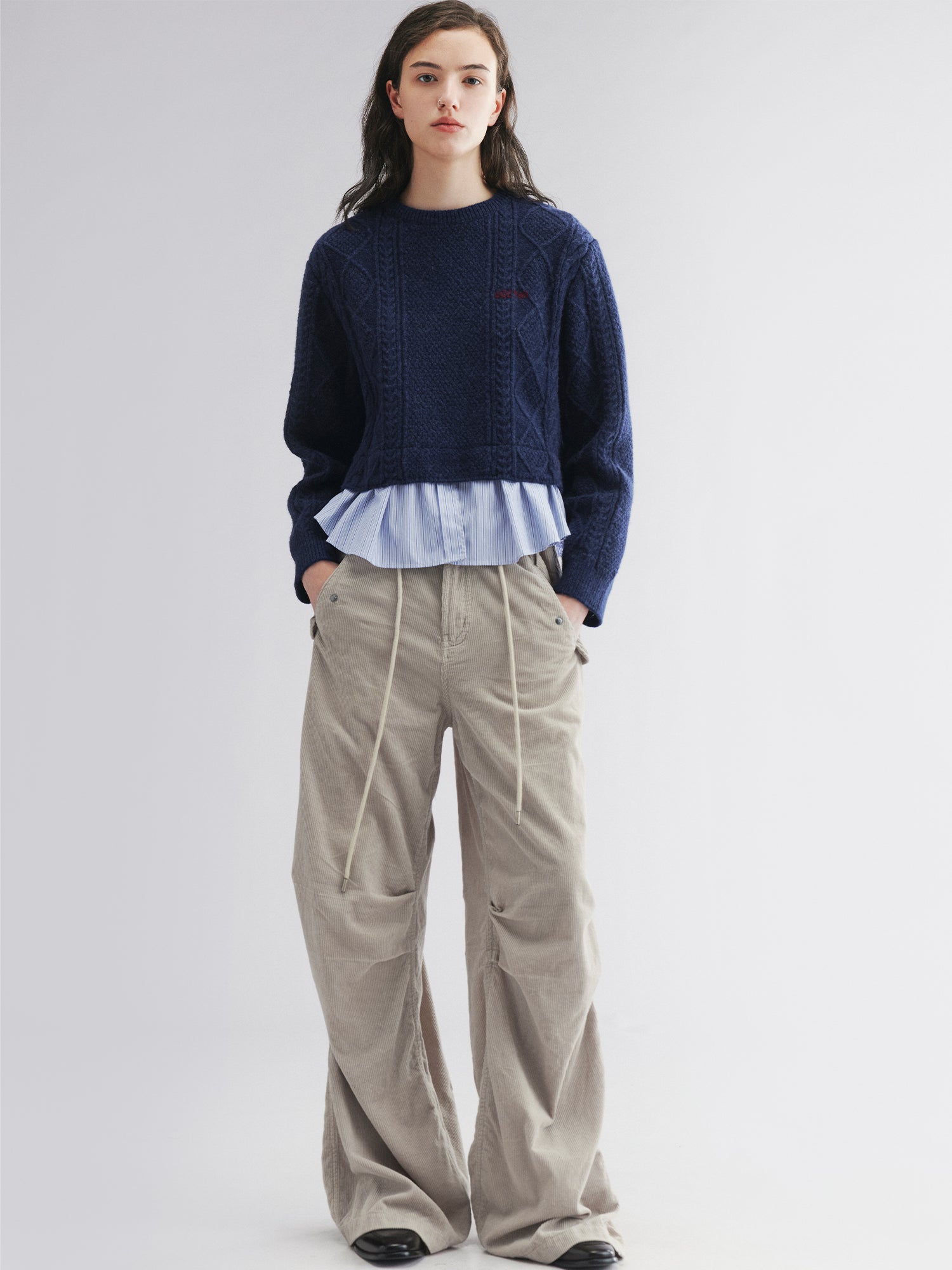 Pullover knit with layered shirt design