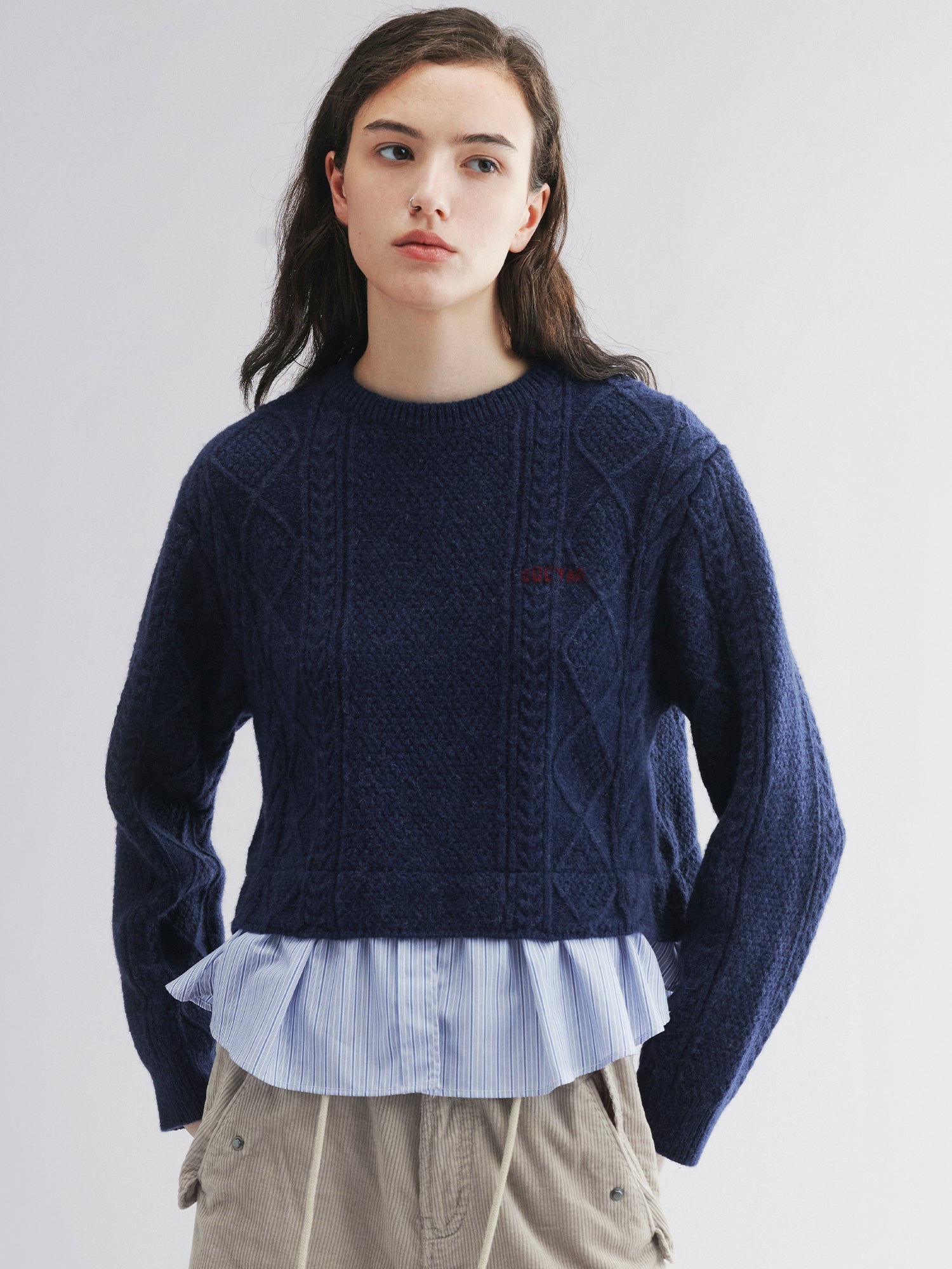 Pullover knit with layered shirt design
