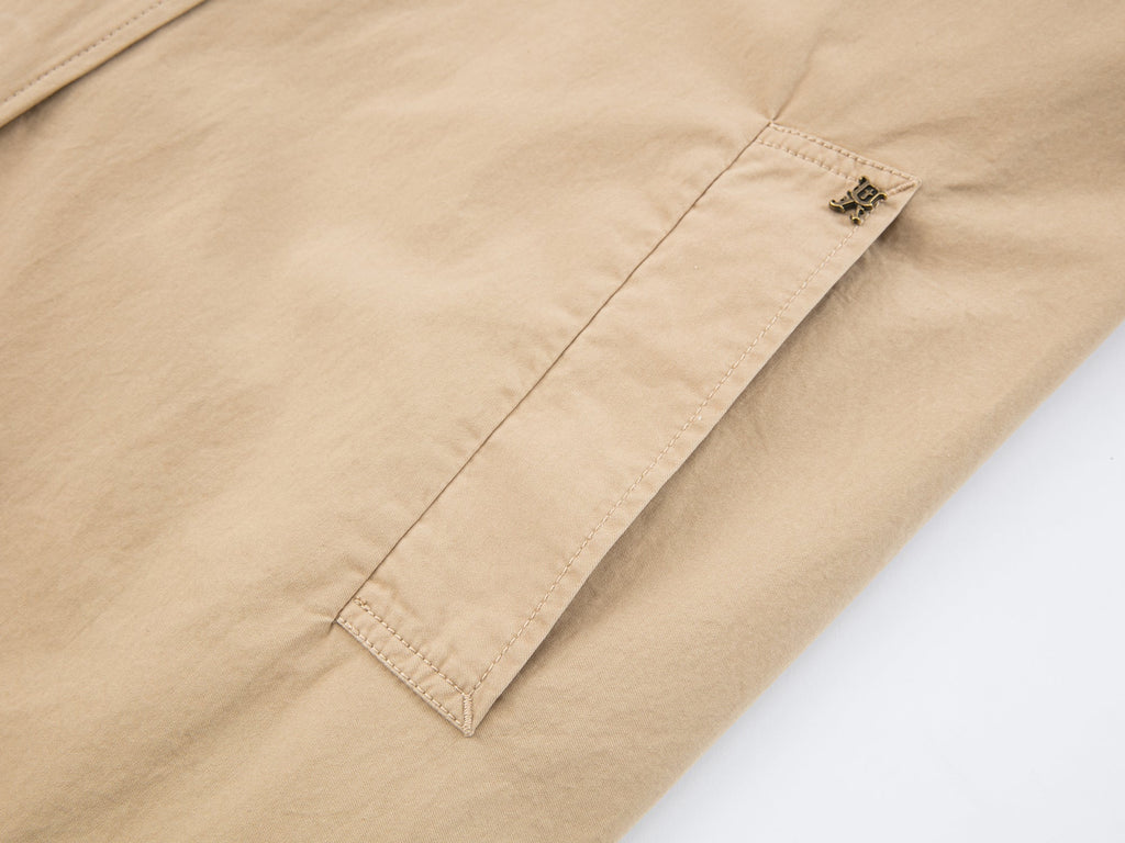 Exposed-lining balmacaan trench coat
