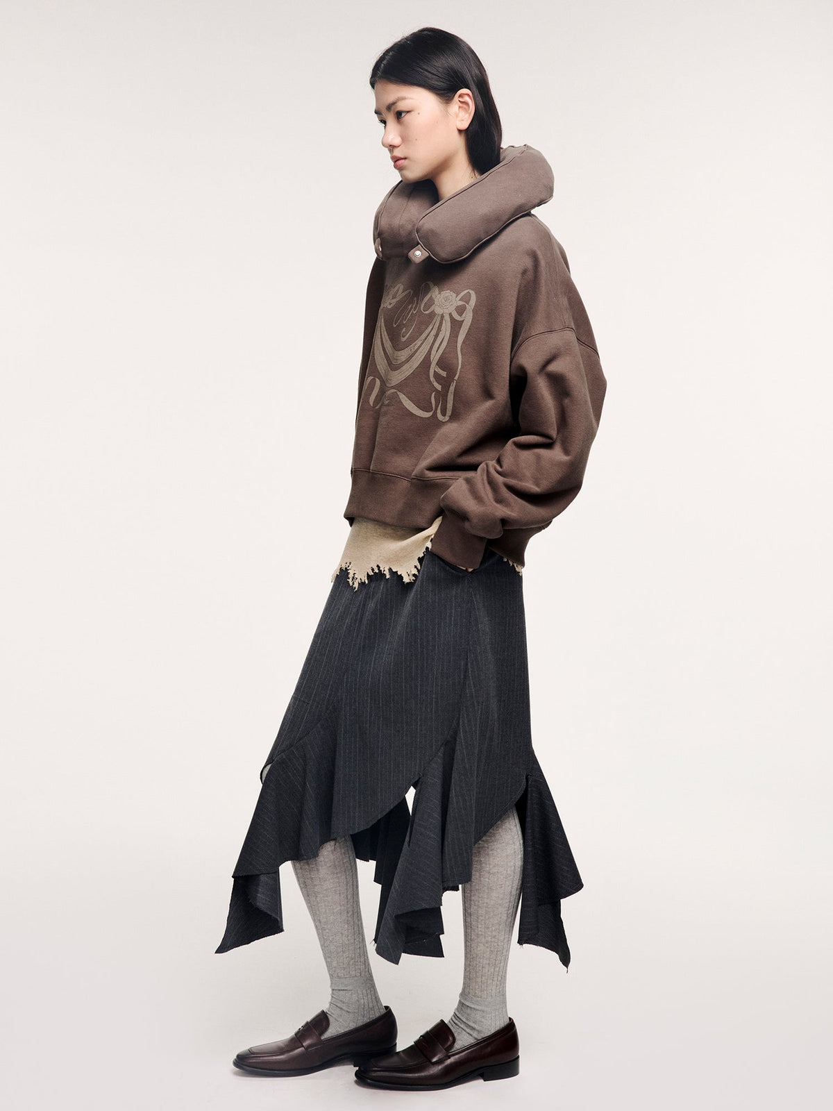 Hoodie with inflatable neck pillow detail