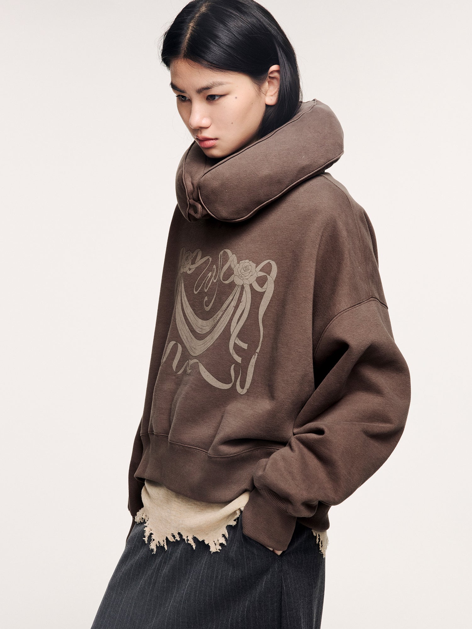 Hoodie with inflatable neck pillow detail