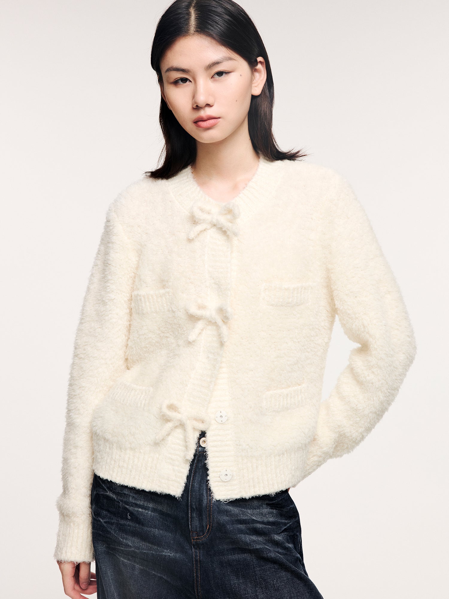 Bow detail knit cardigan in classic French style