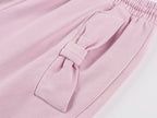 Washed sweatpants with bow detail at the waist