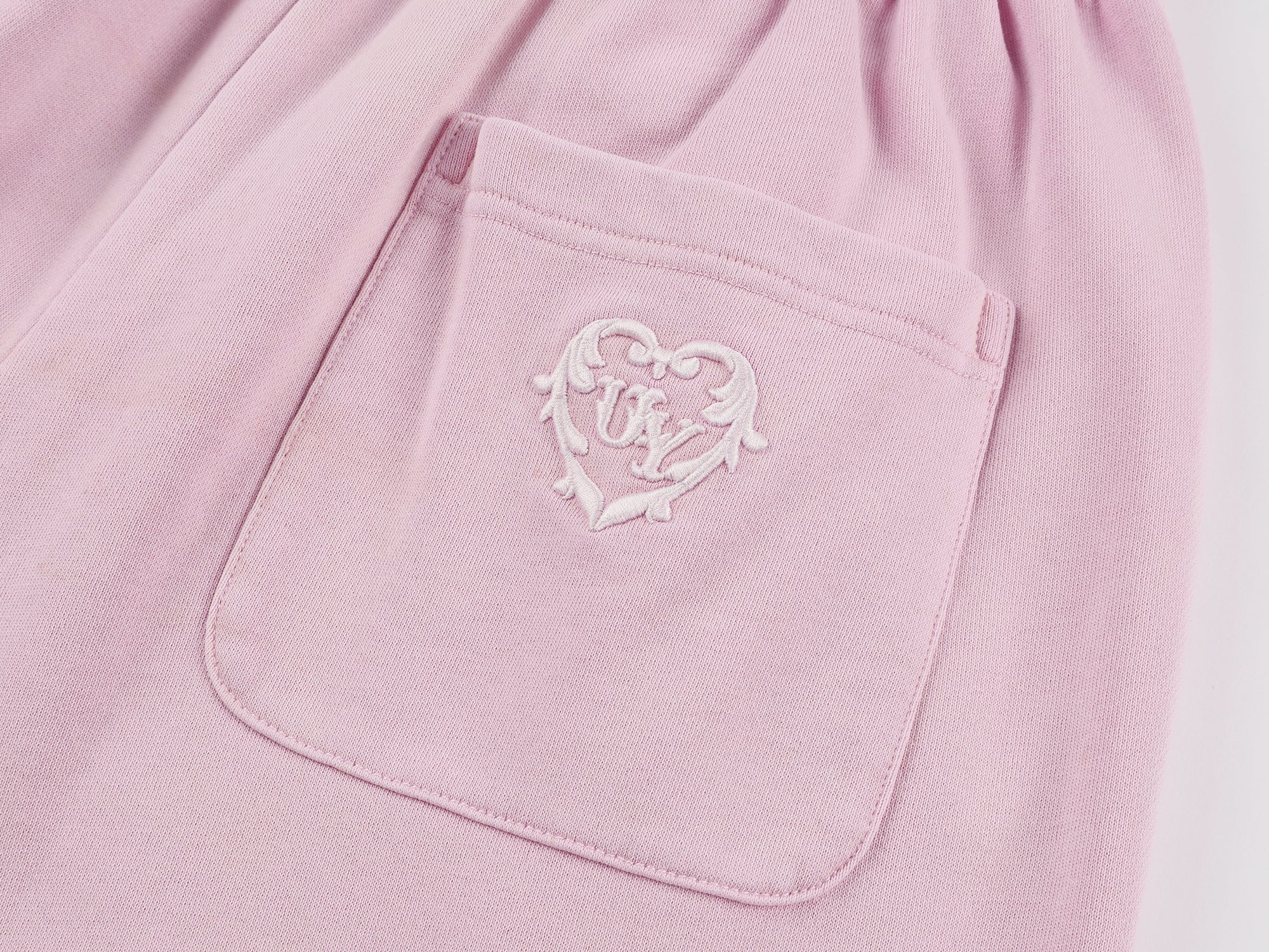 Washed sweatpants with bow detail at the waist